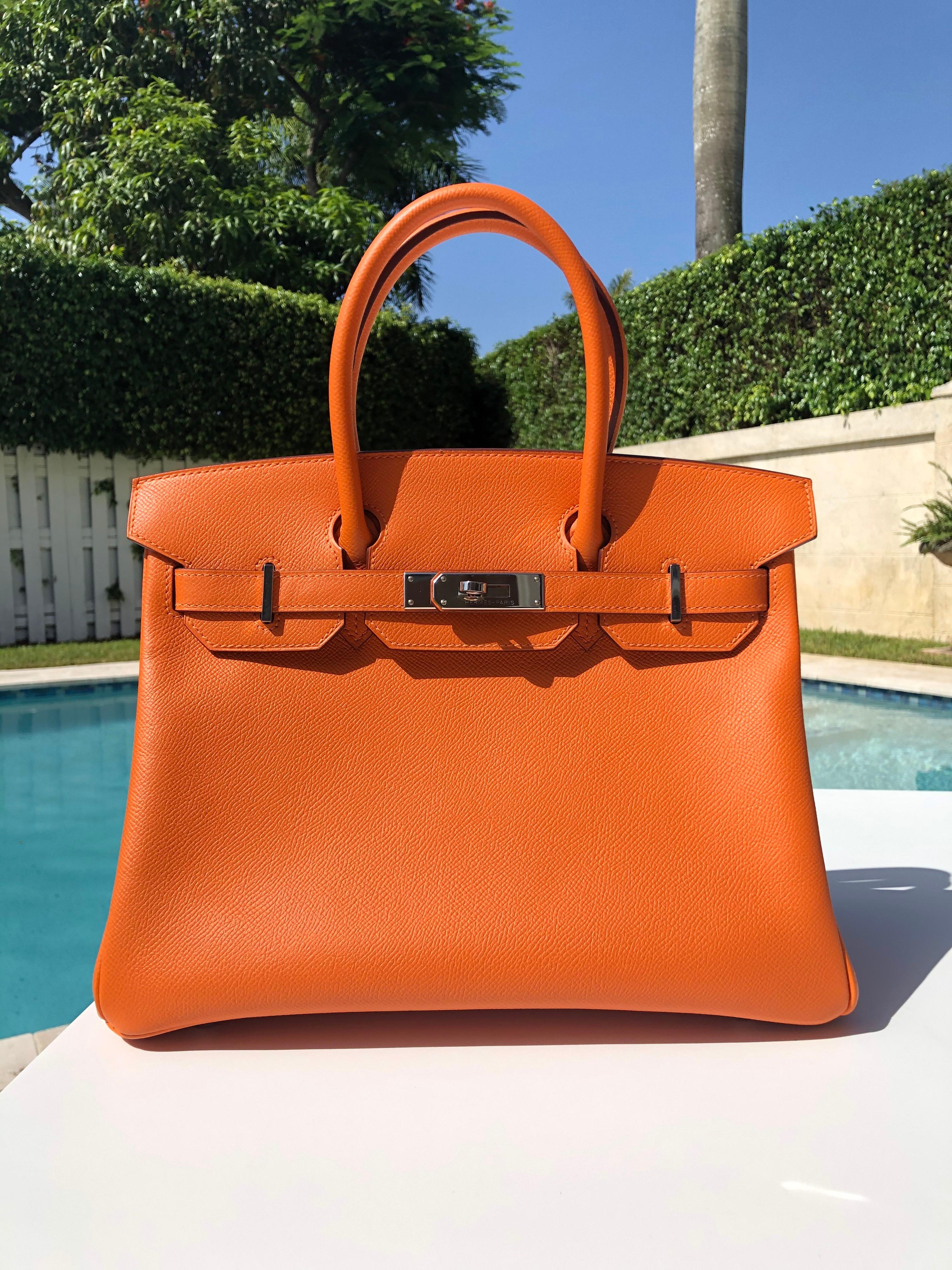 Hermes Birkin 30 Orange Epsom Palladium Hardware. Excellent Pristine Condition, very light hairlines on hardware and perfect structure and corners.

Shop with Confidence from Lux Addicts. Authenticity Guaranteed! 