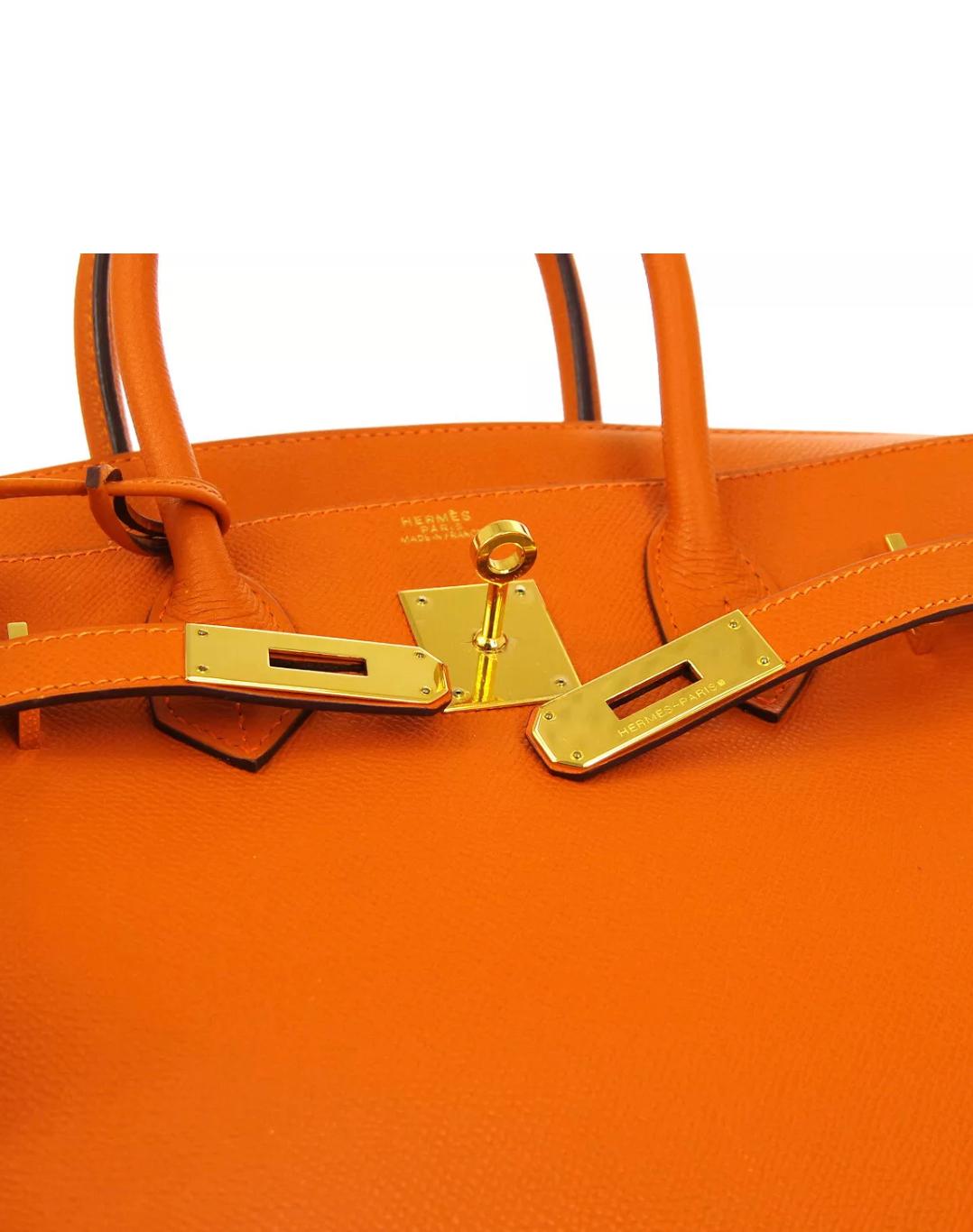 Hermes Birkin 30 Orange Leather Gold Top Handle Satchel Tote Bag

Leather
Gold tone hardware
Leather lining
Date code present
Made in France
Handle drop 3.5