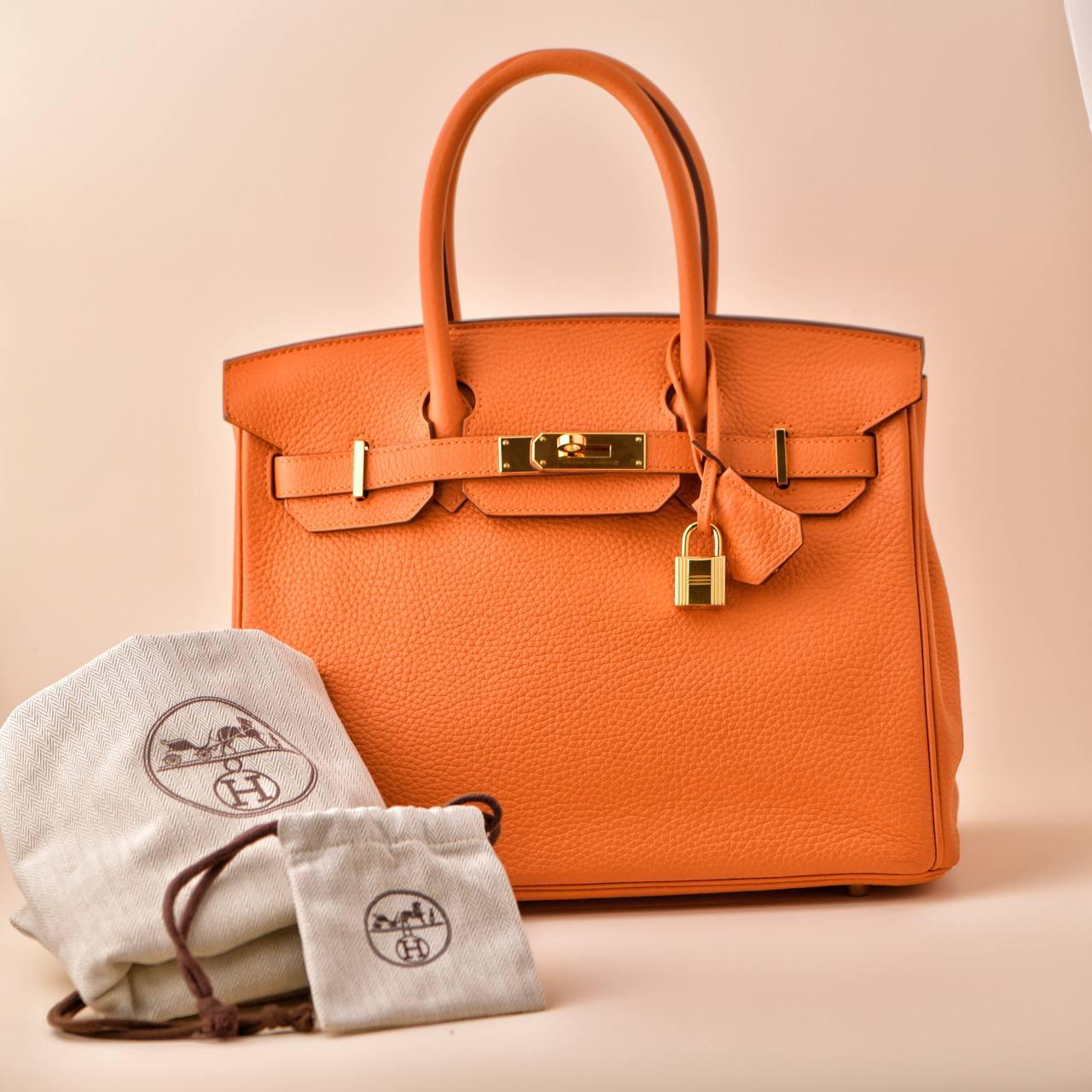 SKU	33301276
Comes With	Hermès Dust Bag, Keys,Padlock,Clochette
Date	2015
Model	Birkin 30
Serial Number	TP****
Metal	Gold-Plated
Materials	Togo Leather
Length	Approximately 30 cm
Condition	Excellent
Other Info	Measuring approximately 30cm x 22cm x