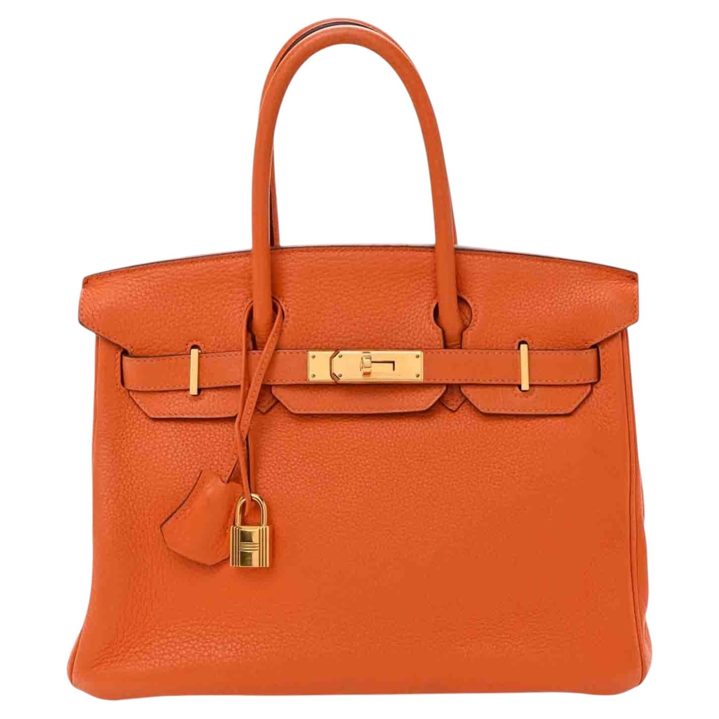 Sac à main Hermès Birkin 30 en cuir Togo orange avec finitions dorées