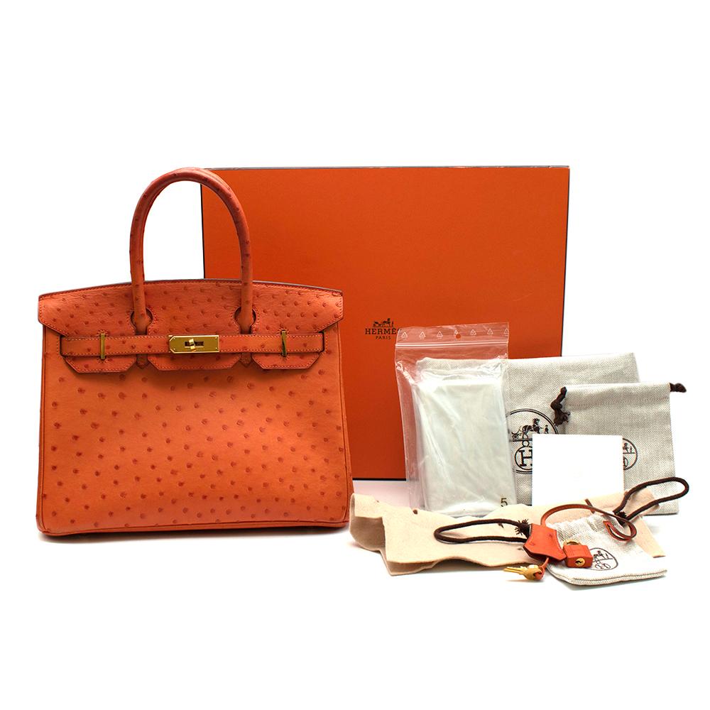 Hermes Birkin 30 Ostrich Tangerine GHW
- Gold hardware
- Date stamp [O] 2011
- Gorgeous Tangerine orange 
- South African Ostrich Leather 
- Includes Box, Dust Bags, Clochette, Lock, and Keys.

Materials
Ostrich Leather

Height: 22cm 
Width: 30cm