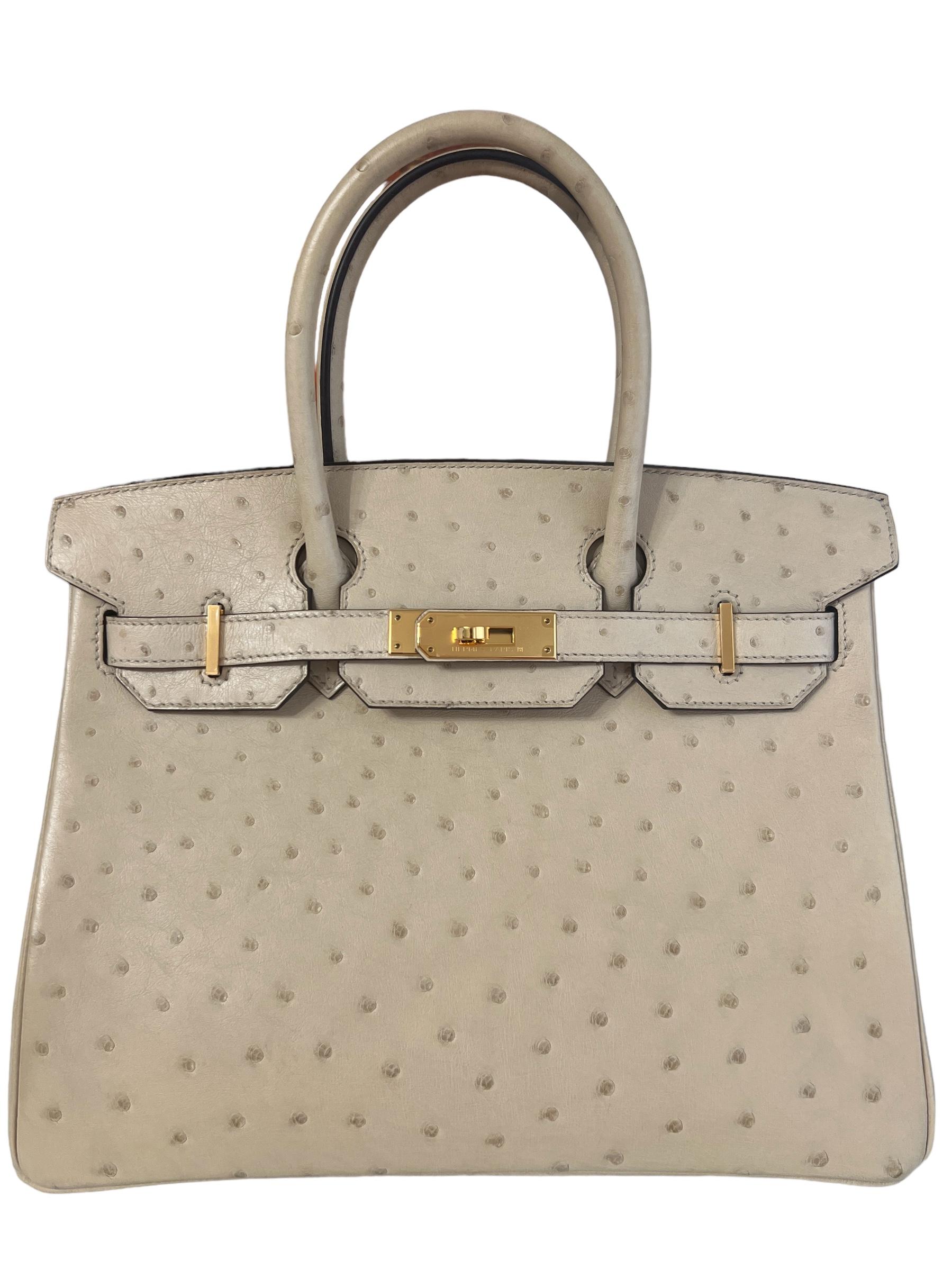 Stunning Rare Hermes Birkin 30 Trench Ostrich complimented by Gold Hardware. Pristine Condition Almost Like New Only worn a few times, with Plastic on all Hardware. 2020 Y Stamp. 

Shop with confidence from Lux Addicts. Authenticity