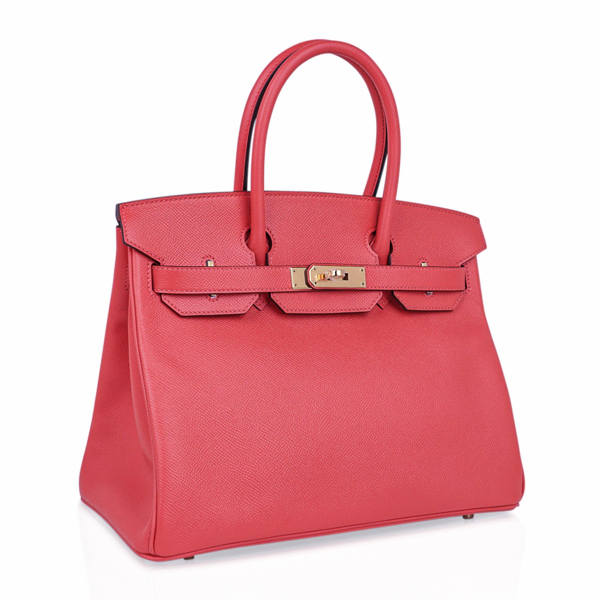 Mightychic offers an Hermes Birkin 30 bag in soft pretty pink Rose Jaipur.
This rare to find beautiful coral pink colour is a blend of orange, pink and red and evokes the sunset.
Epsom leather reveals the world of Hermes colours to perfection, is