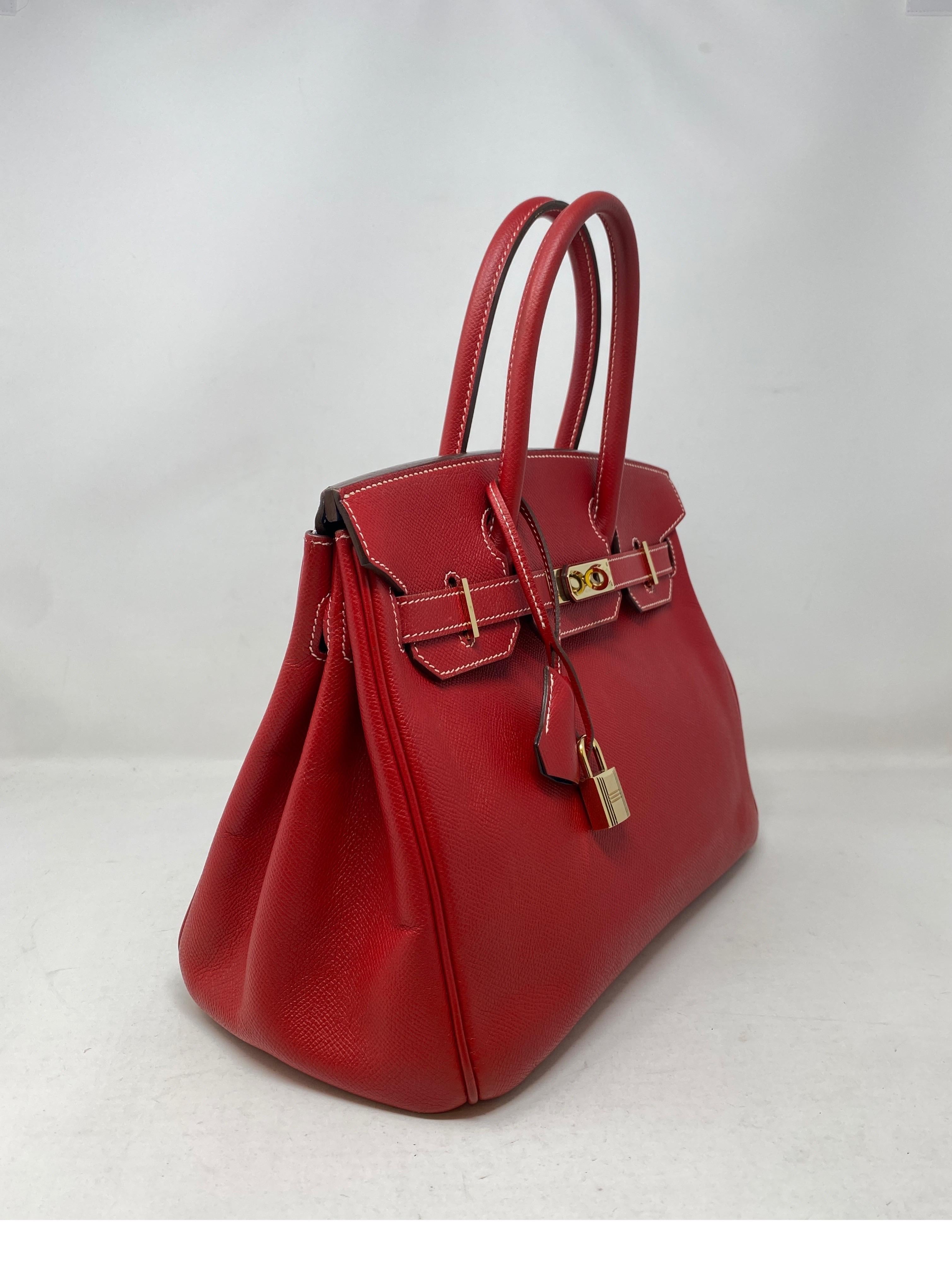 Hermes Birkin 30 Rouge Casaque Candy Bag. Candy red exterior and blue mykonos color interior. Rare candy bag and rare size 30. Don't miss out on this one. Good condition. Plastic is still on hardware. Gold hardware. Great investment bag. Includes