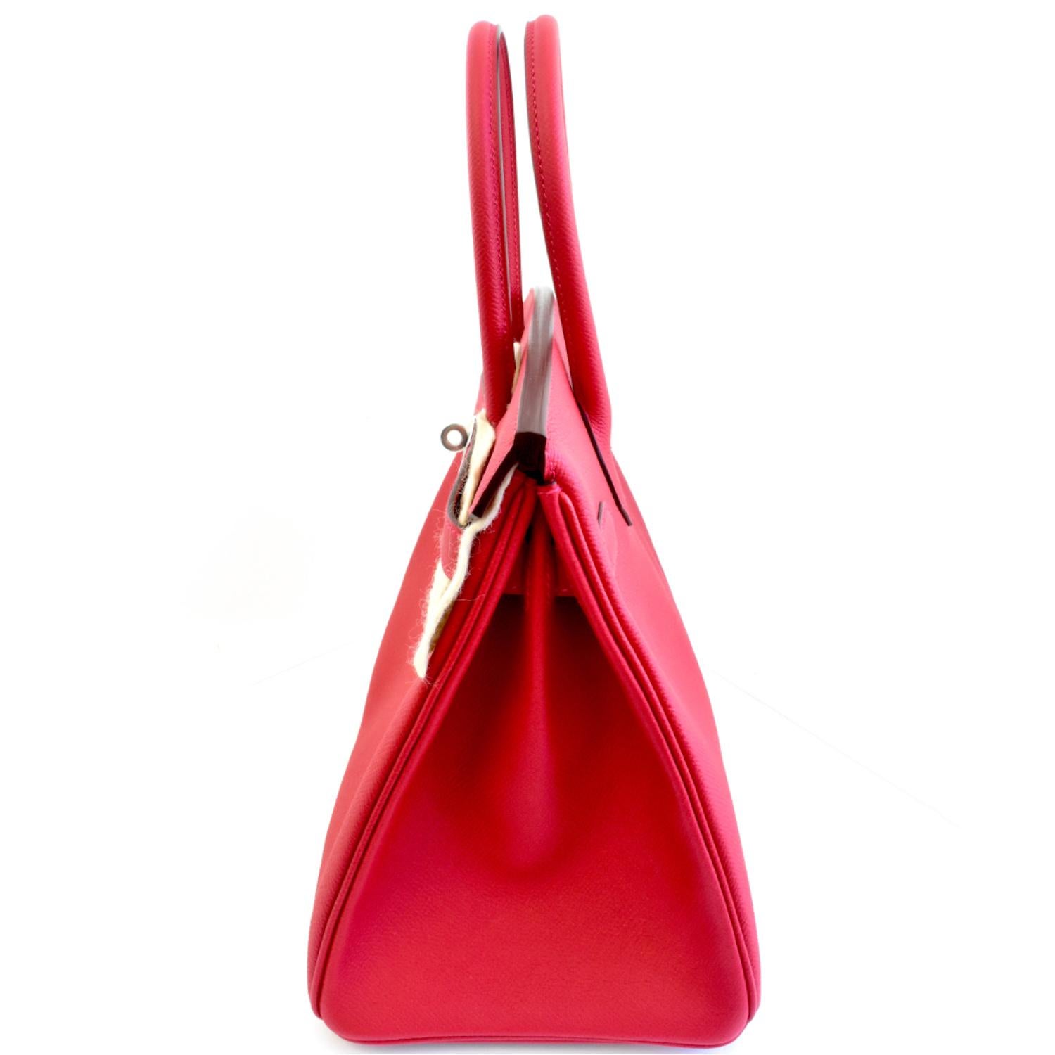 Designer: Hermes

Color: Rouge Casaque

Material: Epsom Leather

Width:  30 cm

Height: 21 cm  ( 8.5 inches)

Depth: 15 cm (6 inches)

Strap Drop: 8 inches

Condition: BRAND NEW

Dustbag: Yes

Includes: 24 Month Brilliance Jewels Warranty 

        