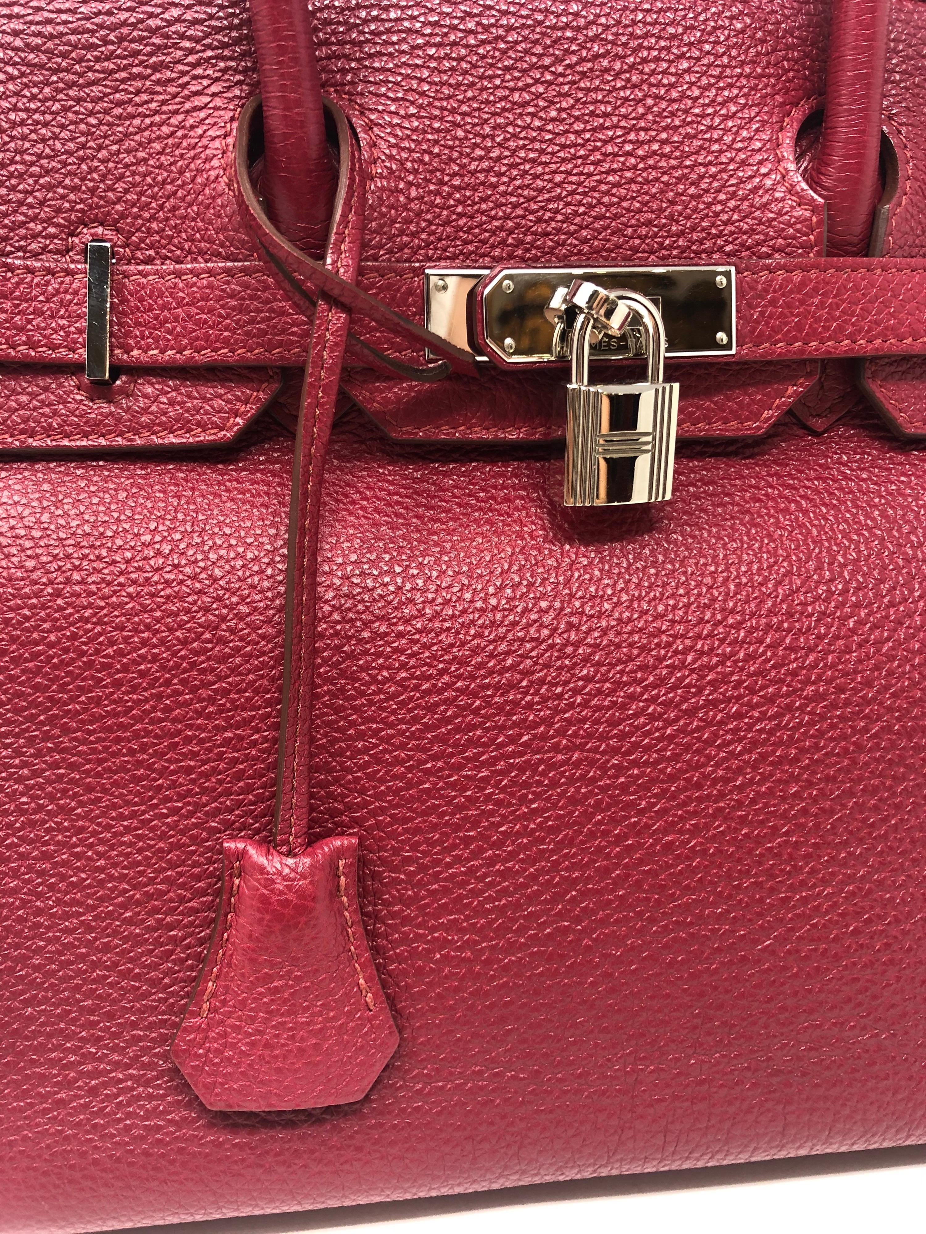 Hermes Rubis Red Birkin 30. Silver hardware. Excellent condition. Most coveted size of the moment. Hard to find. N square stamp. Includes lock, keys, clochette and dust cover. Guaranteed authentic. 