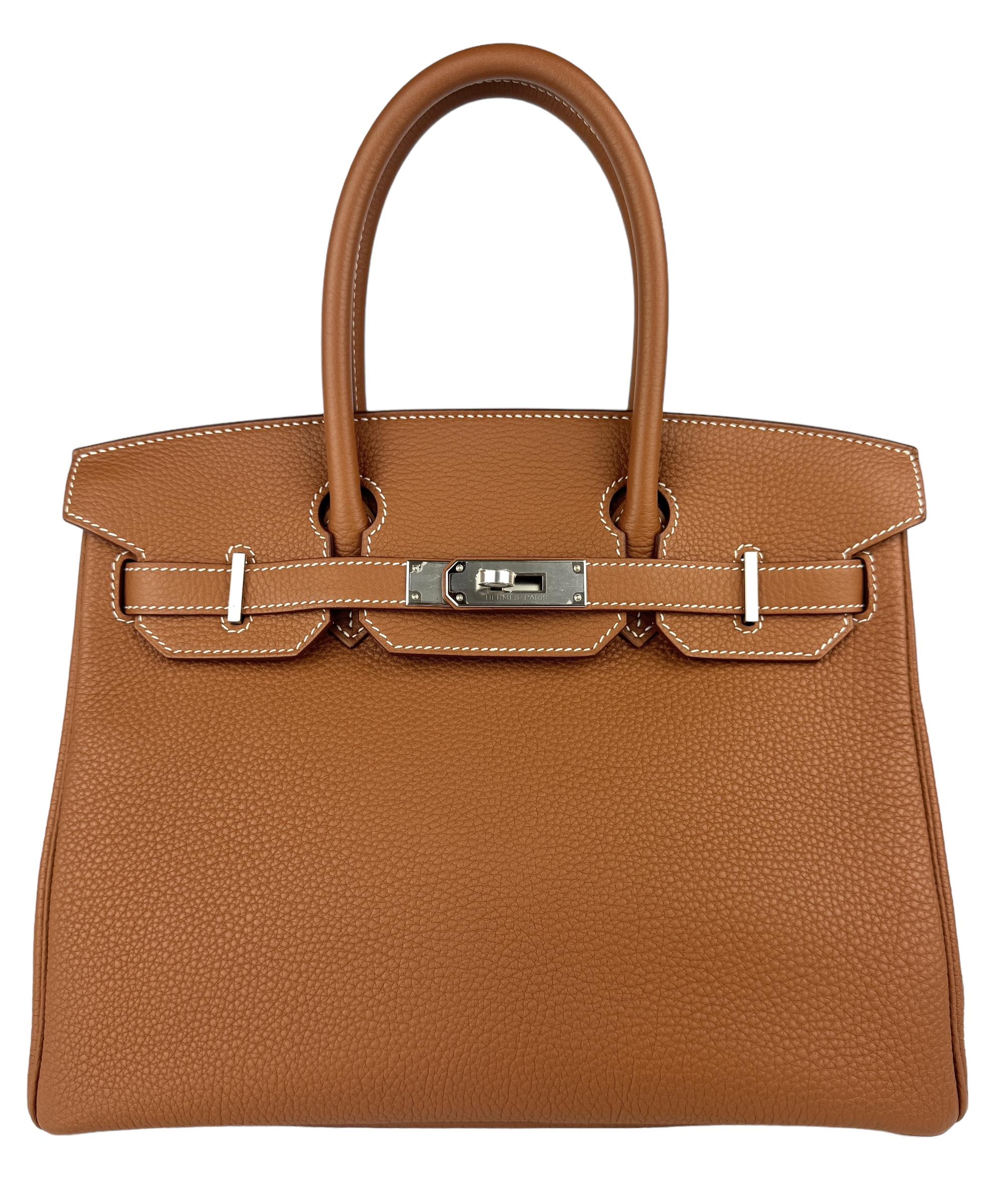 Absolutely Stunning Most Coveted Hermes Birkin 30 Gold Togo Leather complimented by Palladium Hardware. Pristine almost Like New 2021 Z Stamp. Plastic on All Hardware! 

Shop with Confidence from Lux Addicts. Authenticity Guaranteed! 

Please keep
