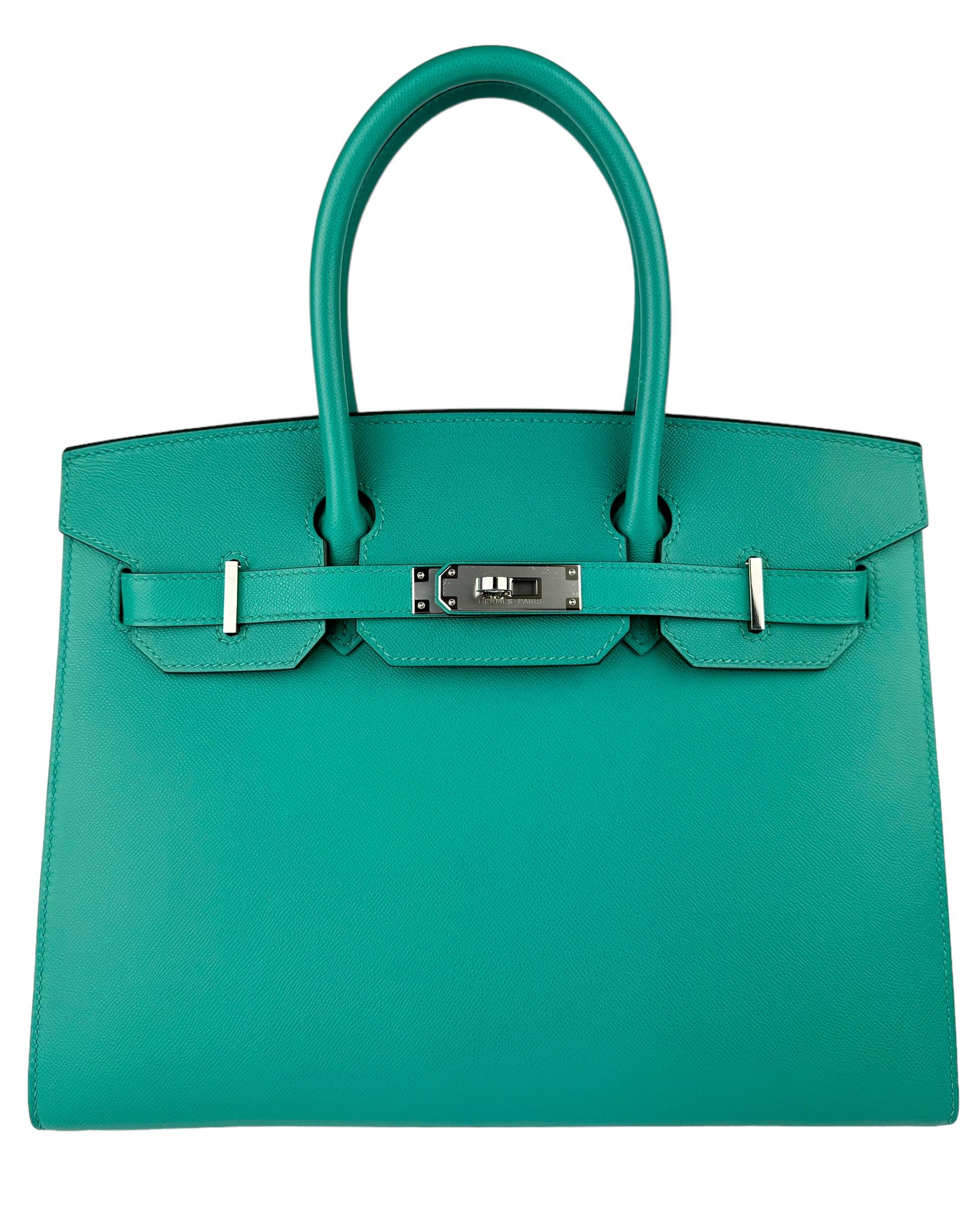 bsolutely Stunning Rare. Limited Edition Hermes Birkin 30 Sellier Vert Verone. Complimented by Madame Leather and Palladium Hardware. Excellent Pre Owned Condition Plastic on Hardware. Z Stamp 2021. 

Please keep in mind that this is a pre owned