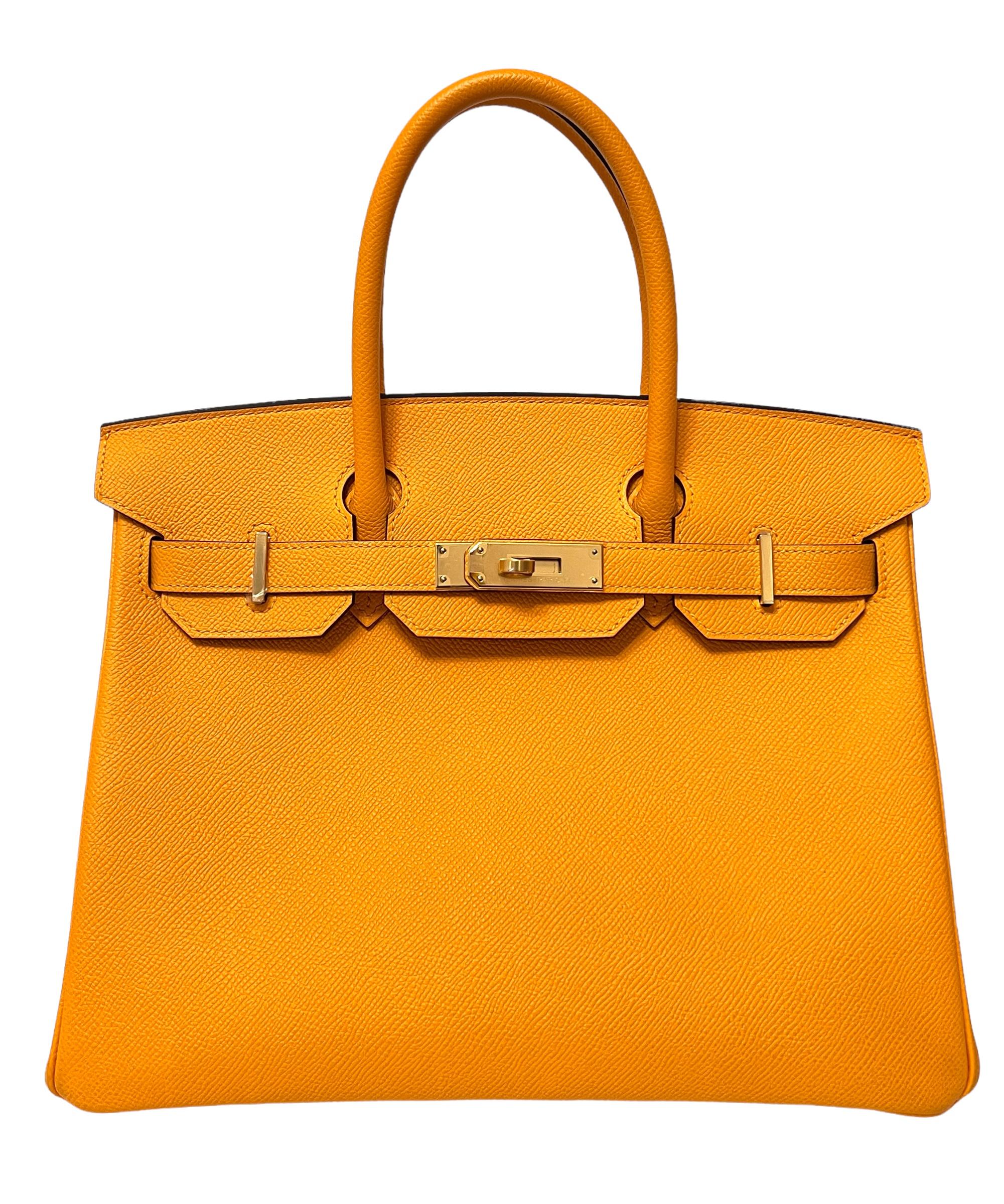 Stunning As New 2021, 1 of 1 HSS Special Order Hermes Birkin 30 Jaune D’or Epsom Leather complimented by Gold Hardware. Like new with Plastic on Hardware and feet. Z Stamp 2021.

Shop with confidence from Lux Addicts. Authenticity Guaranteed!