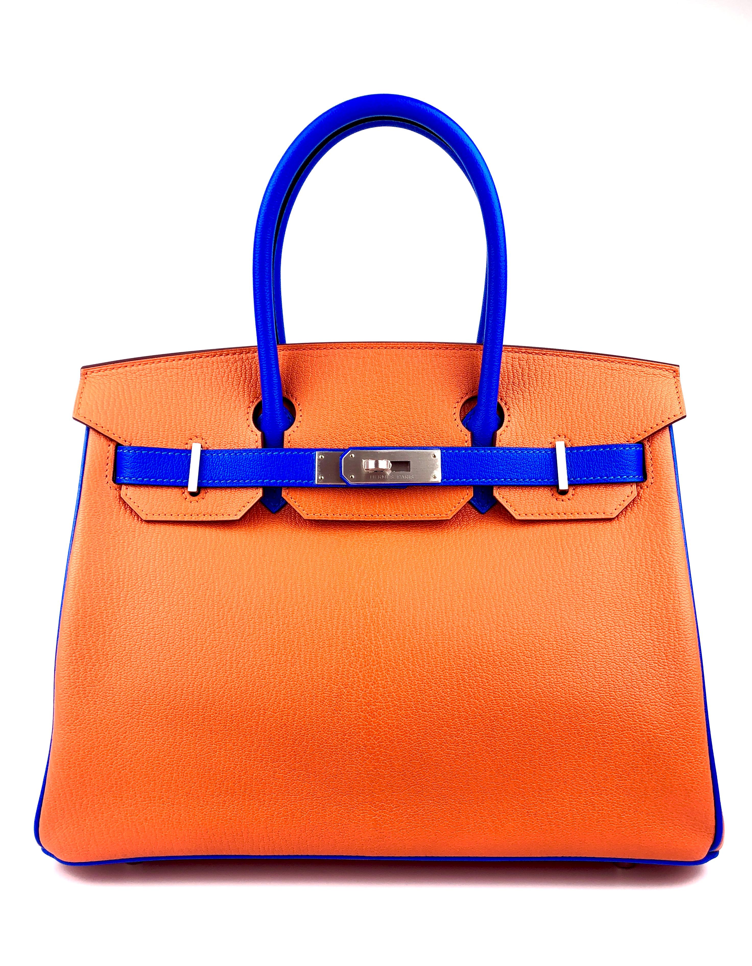 As New Stunning 1 of 1 Hermes Birkin 30 HSS Special Order Orange and Blue Hydra Leather Complimented by Brushed Palladium Hardware. All Plastic on hardware and Feet! Kept Unworn from Collectors closet. 


Shop with Confidence from Lux Addicts.