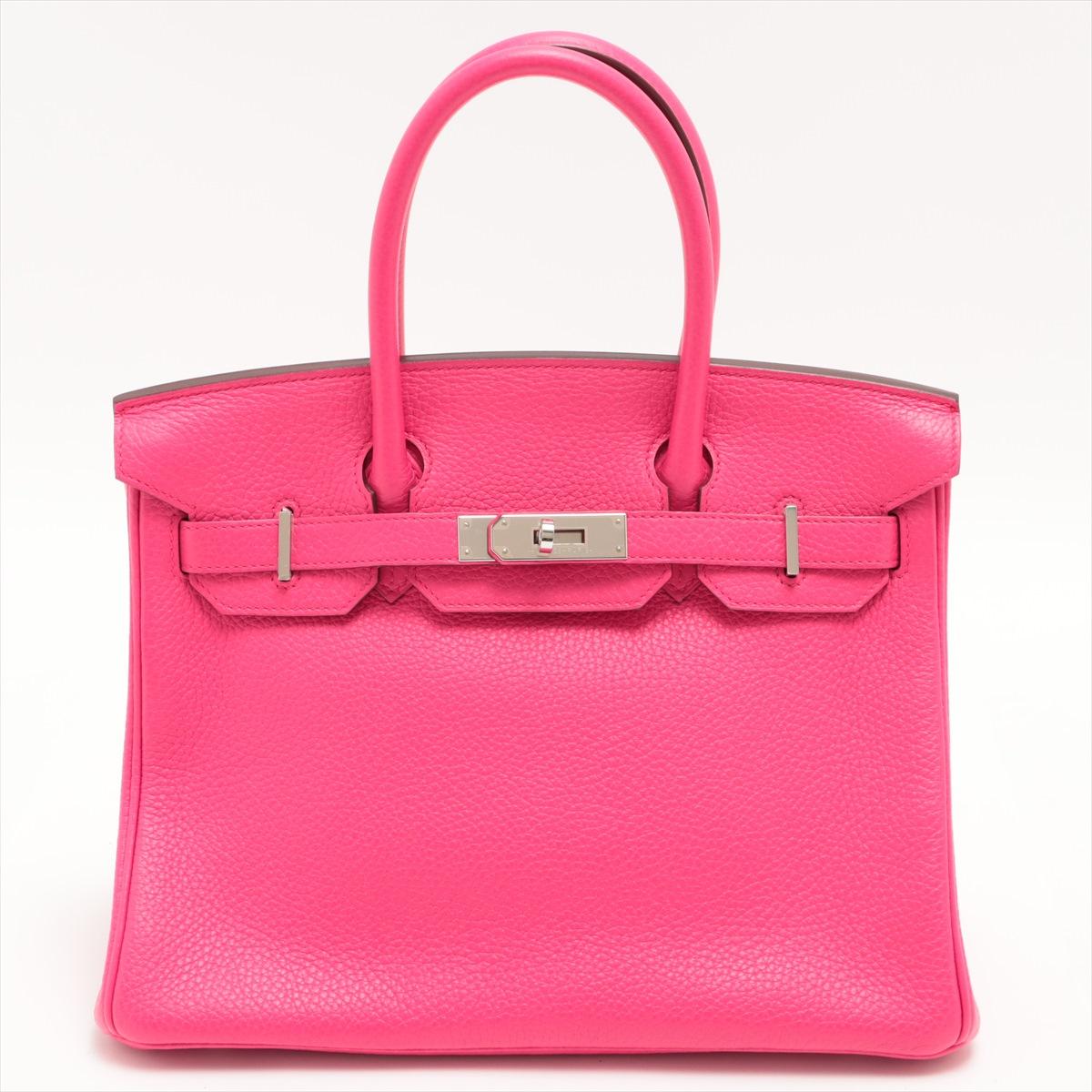 The Hermes Birkin 30 Taurillon Clemence in Rose is the epitome of luxury and elegance. Crafted with the utmost care and attention to detail, the iconic handbag is a symbol of sophistication and timeless style. Made from exquisite Taurillon Clemence