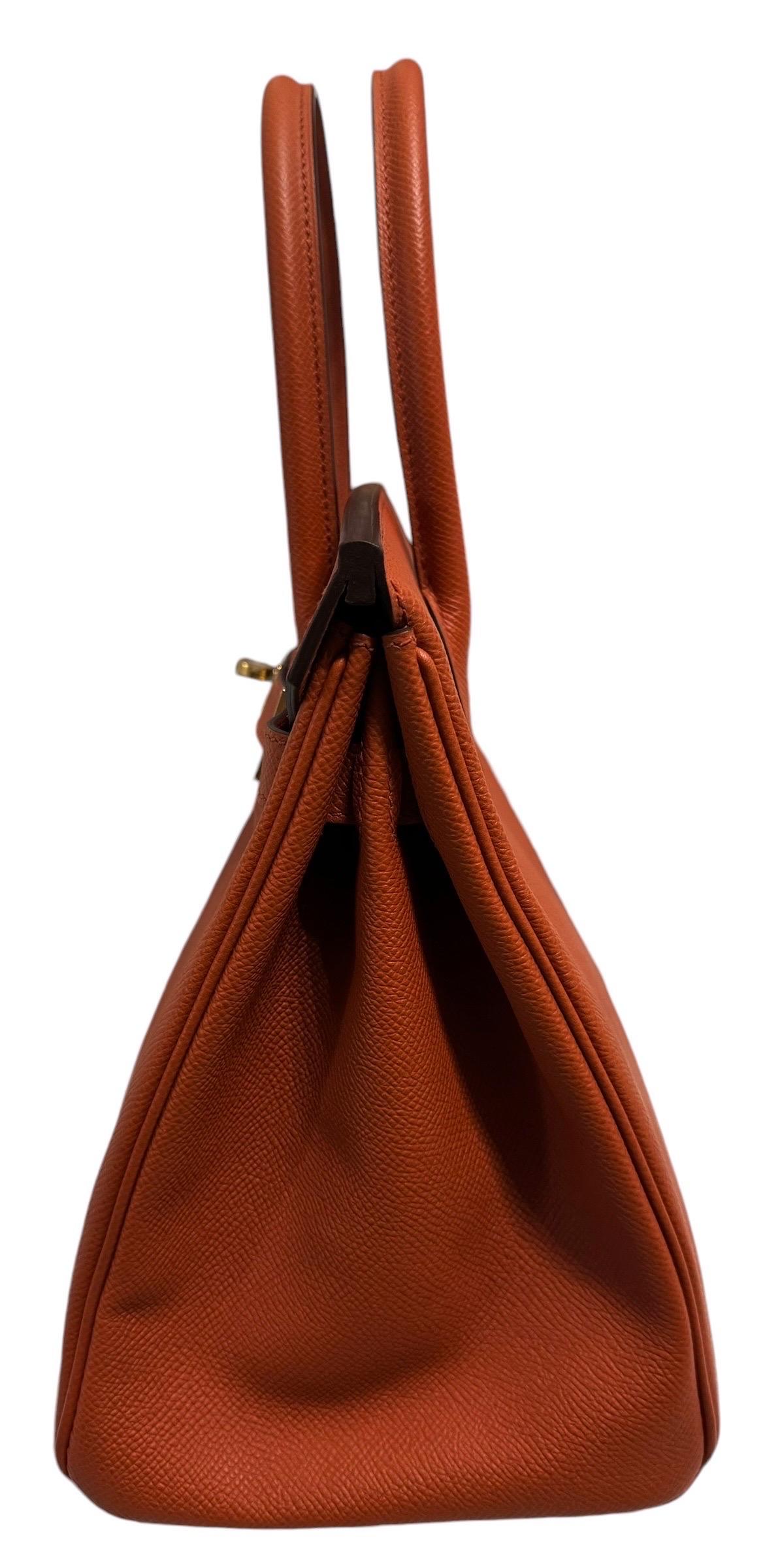 Brown Hermes Birkin 30 Terre Battue Epsom Leather complimented by Gold Hardware.