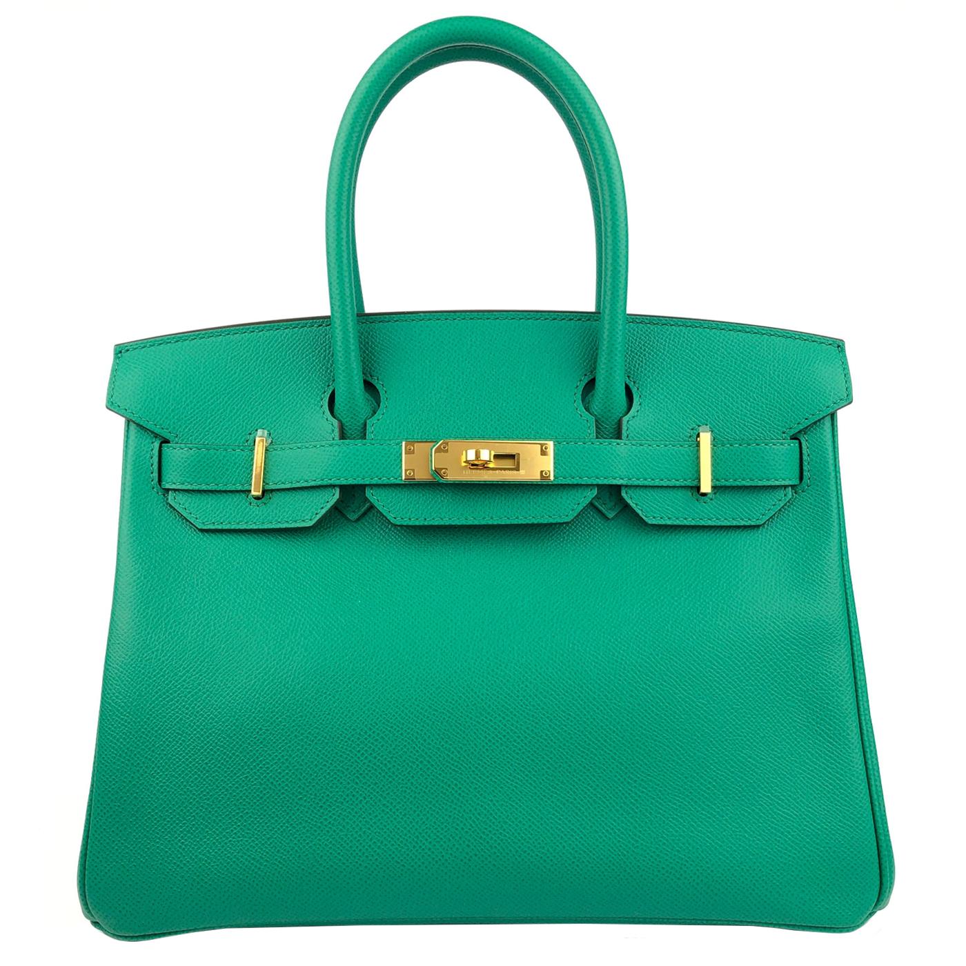 Absolutely Stunning 2022 Hermes Birkin 30 Vert Jade Epsom Leather Gold Hardware. This Birkin is in Vert Jade Epsom leather with gold hardware and has tonal stitching, a front flap, two straps with center toggle closure, clochette with lock and two