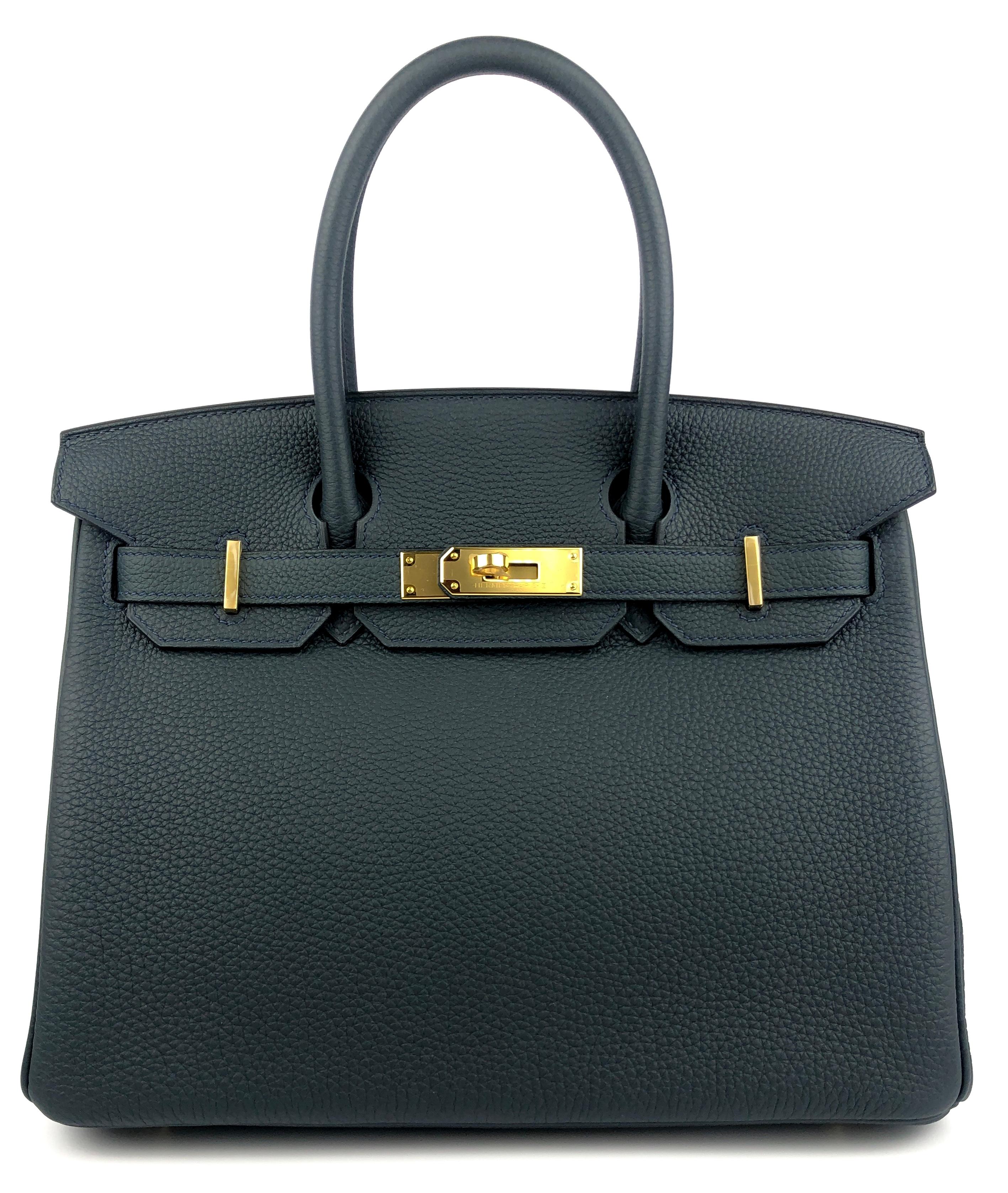 Absolutely Stunning Rare Hermes Birkin 30 Vert Rousseau Togo Leather complimented by Gold Hardware. As New 2019 D Stamp. Beautiful Dark Green looks Black at Night.

Shop with Confidence from Lux Addicts. Authenticity Guaranteed! 
