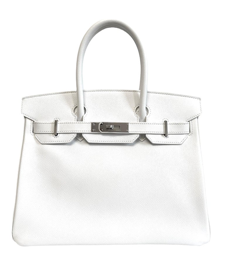 Absolutely Stunning and Rare Hermes Birkin 30 White Epsom Leather Palladium Hardware. Excellent Condition, excellent corners and structure.

Shop with Confidence from Lux Addicts. Authenticity Guaranteed! 