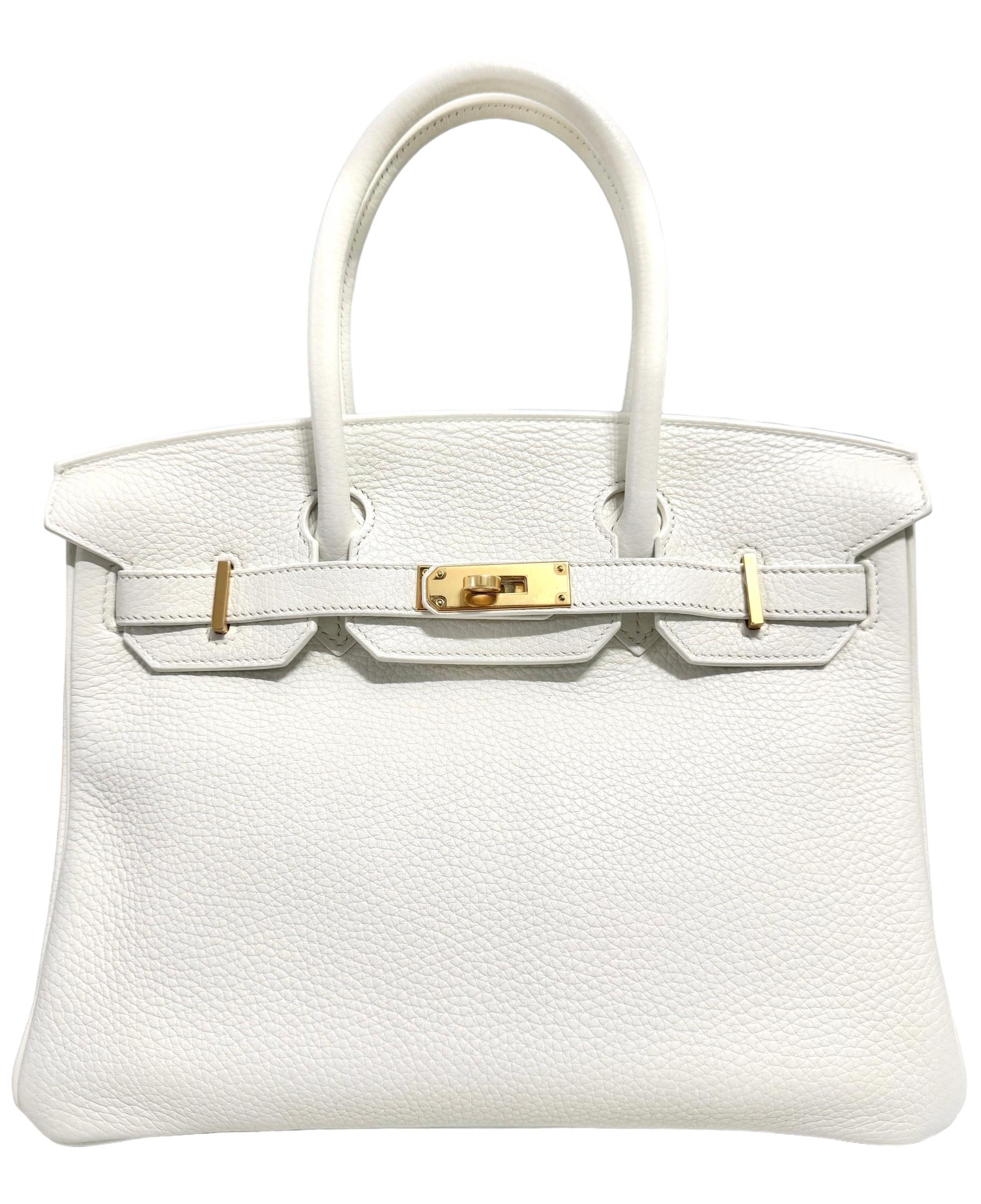 Absolutely Stunning Rare Hermes Birkin 30 White Leather complimented by Gold Hardware. Excellent Condition with Plastic on Hardware. 

Shop with Confidence from Lux Addicts. Authenticity Guaranteed! 

Please keep in mind that this is a pre owned