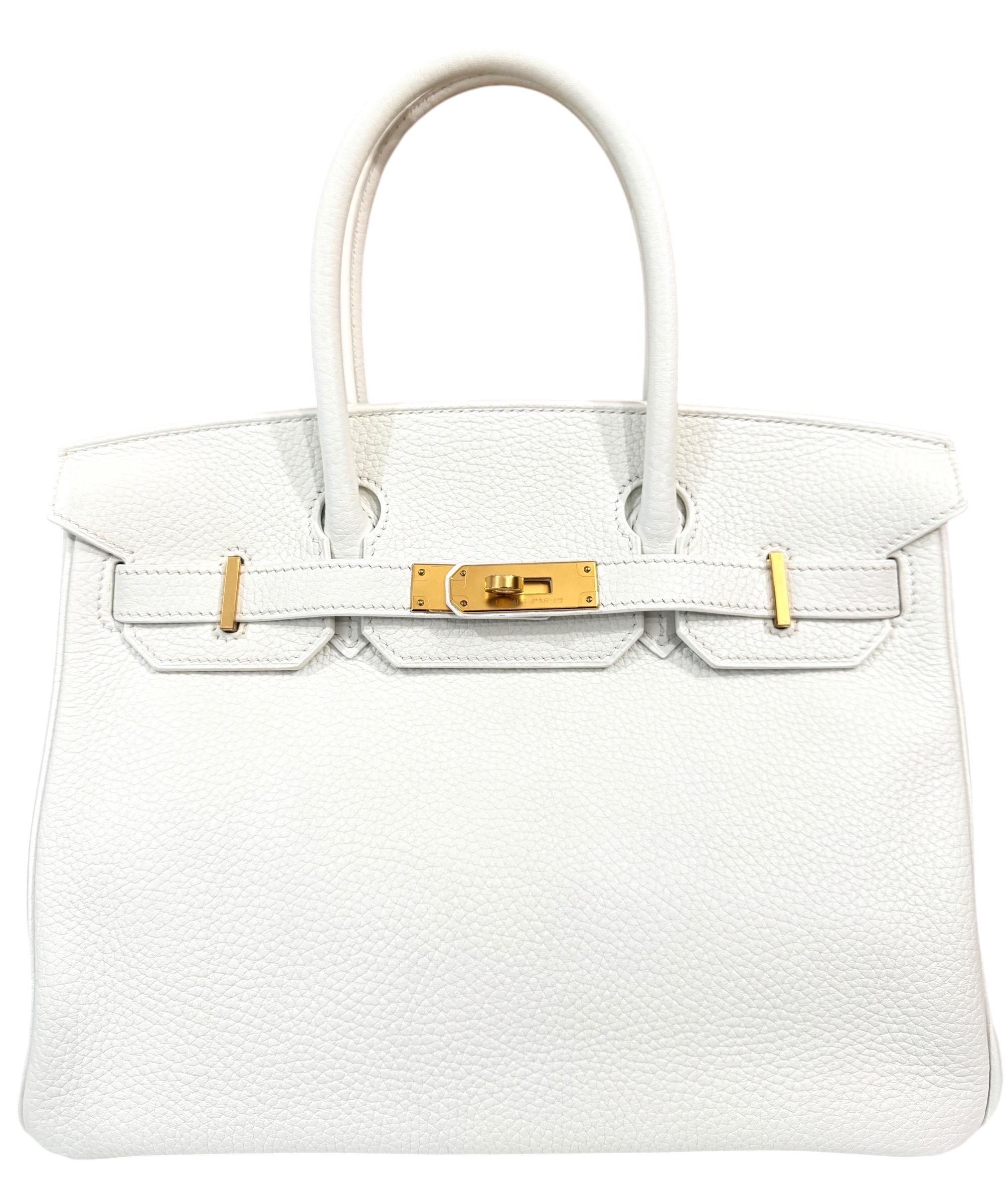Absolutely Stunning Rare Hermes Birkin 30 White Leather complimented by Gold Hardware. Pristine Condition with Plastic on Hardware.

Shop with Confidence from Lux Addicts. Authenticity Guaranteed!

Please keep in mind that this is a pre owned item,