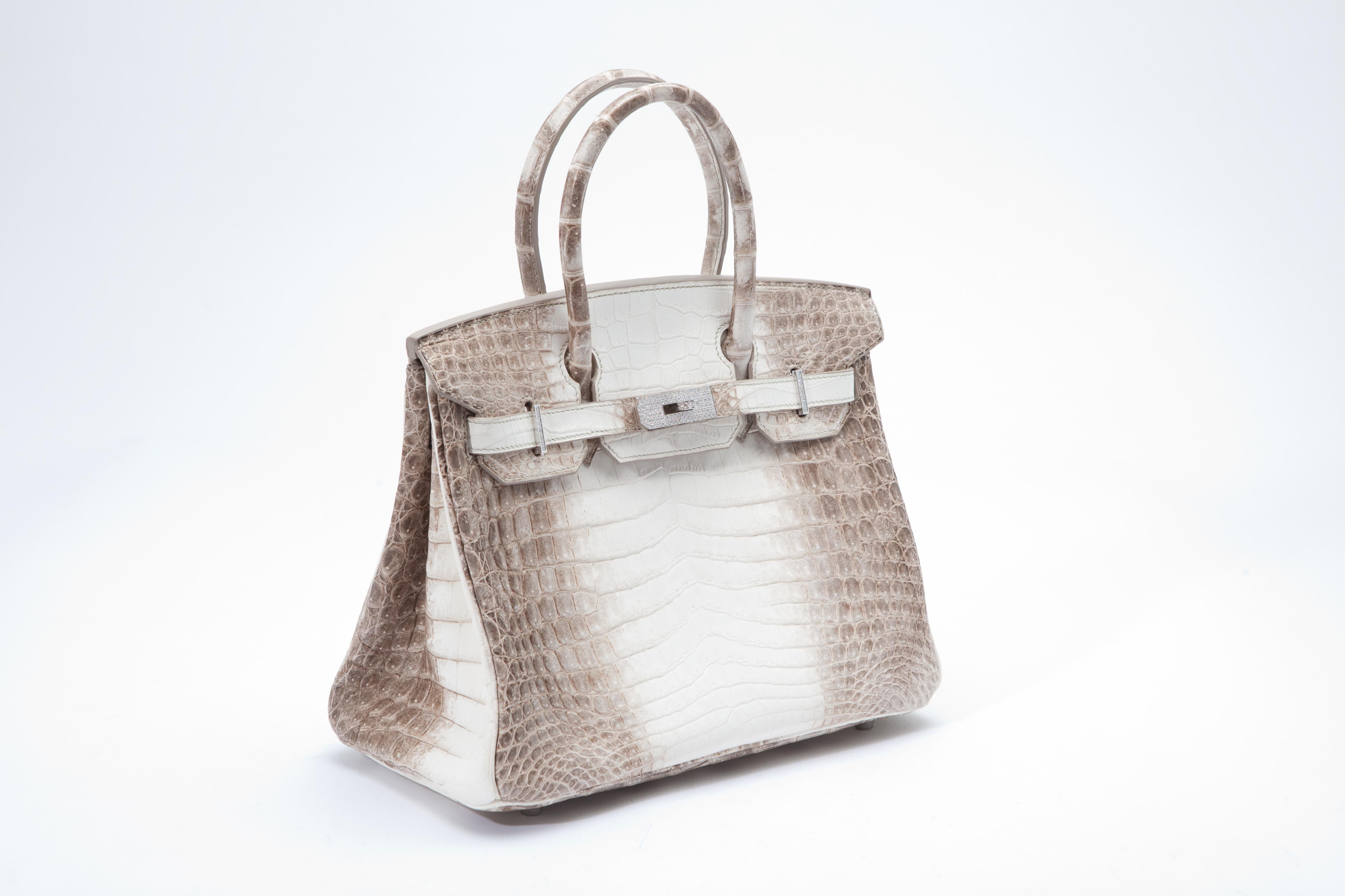 Hermes Birkin 30cm in ultra rare Himalayan crocodile leather with diamond hardware.  Without doubt the world's most coveted handbag. 

Packaged in its original packaging with all applicable CITES documents.

