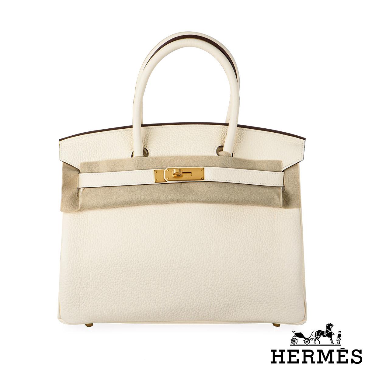 A breathtaking Hermès 30cm Birkin bag. The exterior of this Birkin is in Nata Taurillon Clemence leather with tonal stitching. It features gold tone hardware with two straps and front toggle closure. The interior features a zip pocket with an Hermès