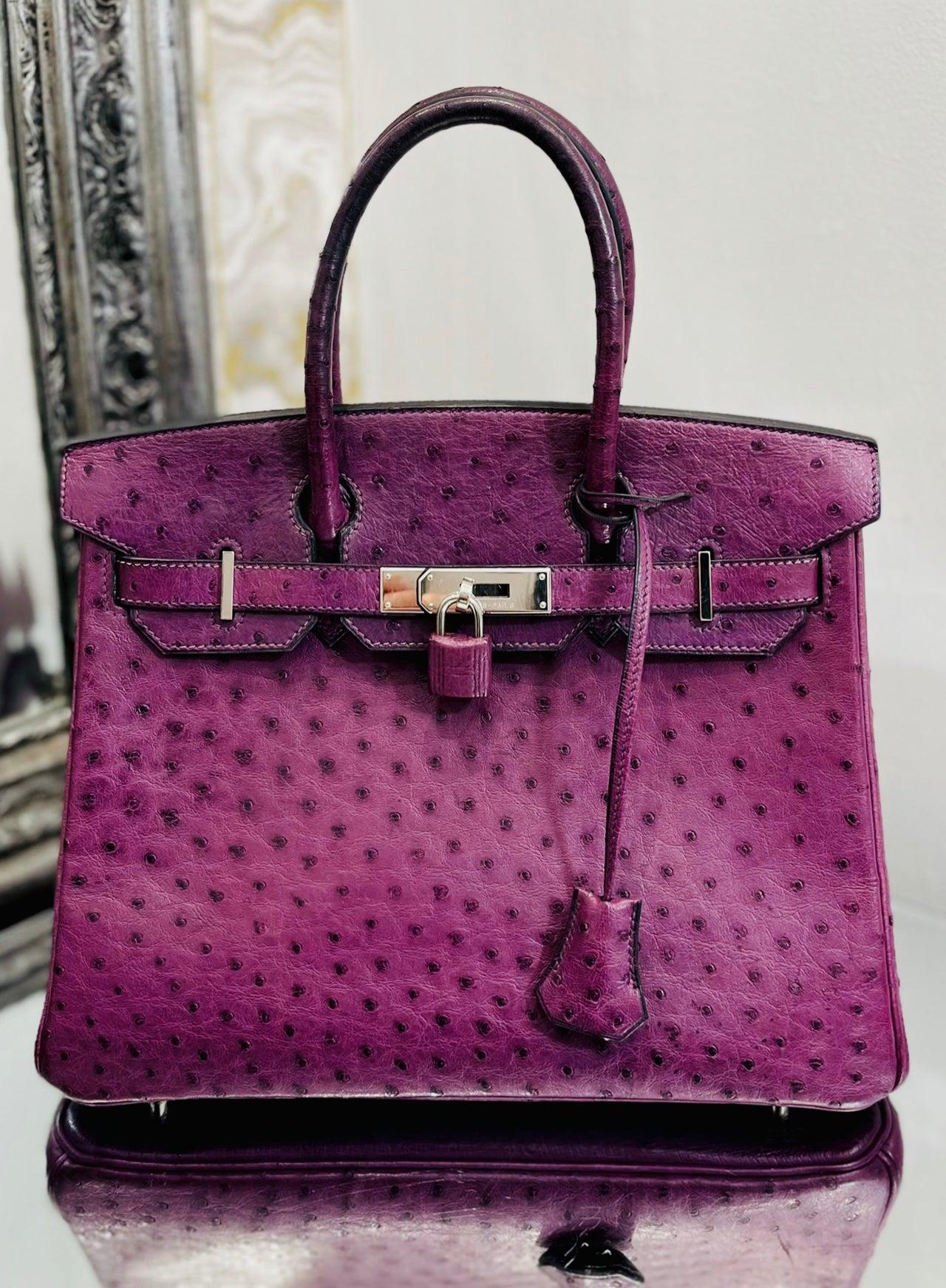 Hermes Birkin 30 Ostrich Skin Handbag 

Violette purple, Birkin bag with palladium hardware.

Top carry handles, flap closure and clochette with padlock

and keys. Leather interior. Date stamp 2010.

Size - Height 22cm , Width 30cm, Depth