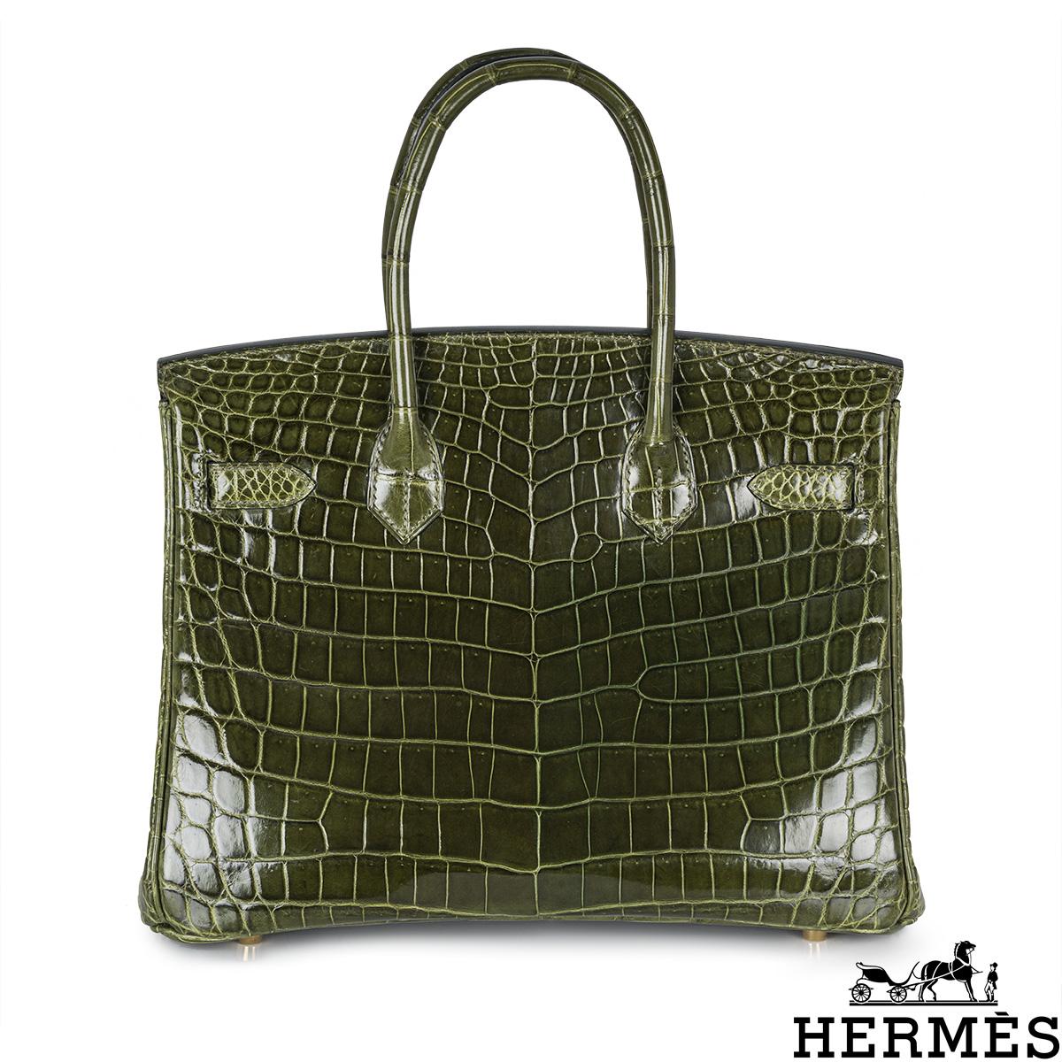A beautiful Hermès 30cm Birkin bag. The exterior of this exotic Birkin is in a shiny Vert Veronese Crocodile with tonal stitching. It adorns gold-tone hardware, two top handles and front toggle closure. The interior features a zipper pocket with an