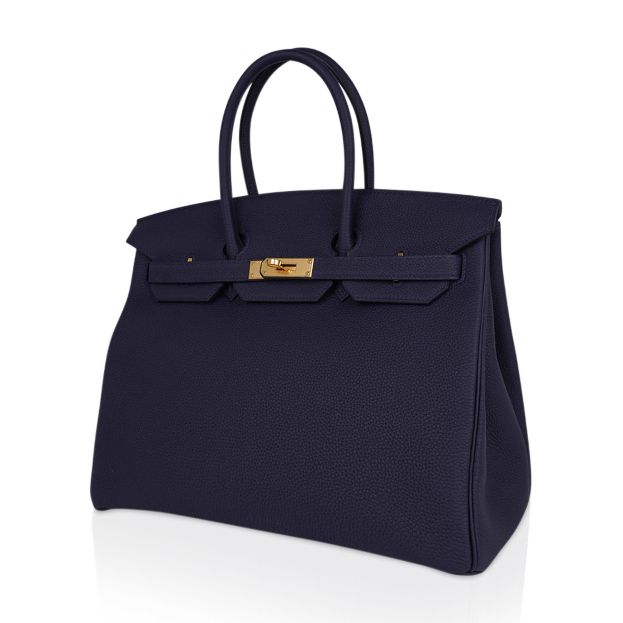 Mightychic offers an Hermes Birkin 35 bag featured in rich deep Bleu Nuit.
This beauty comes in Togo leather with Gold hardware.
Comes with lock, keys, clochette, sleeper, raincoat and signature Hermes box with ribbon.
New or Never Worn.
final
