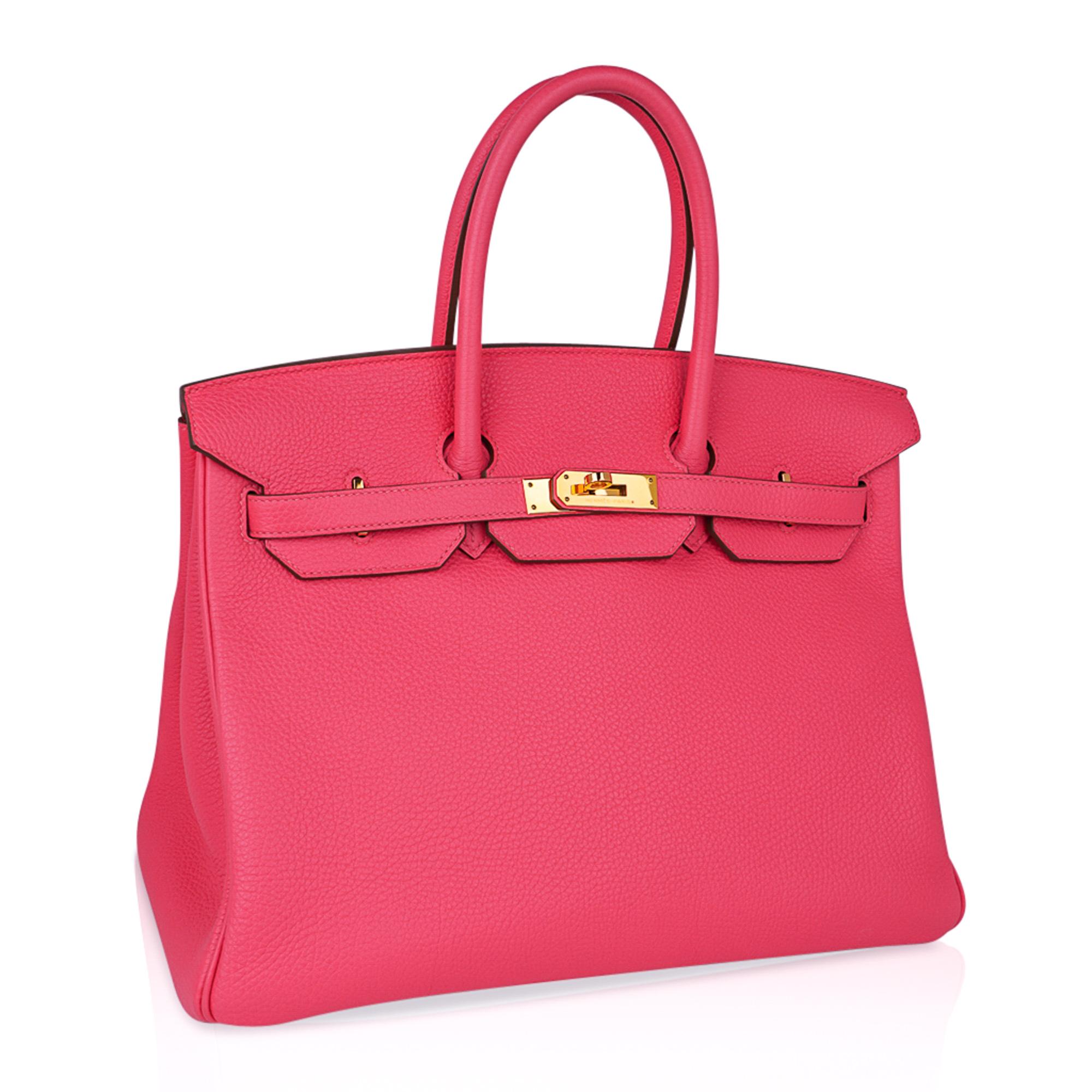 Mightychic offers an Hermes Birkin 35 bag features the coveted and very rare Rose Lipstick Pink.
Lush with gold hardware.
Togo leather is scratch resistant. 
This beauty is in superior condition.  
No wear to the corners or handles.  Barely a mark