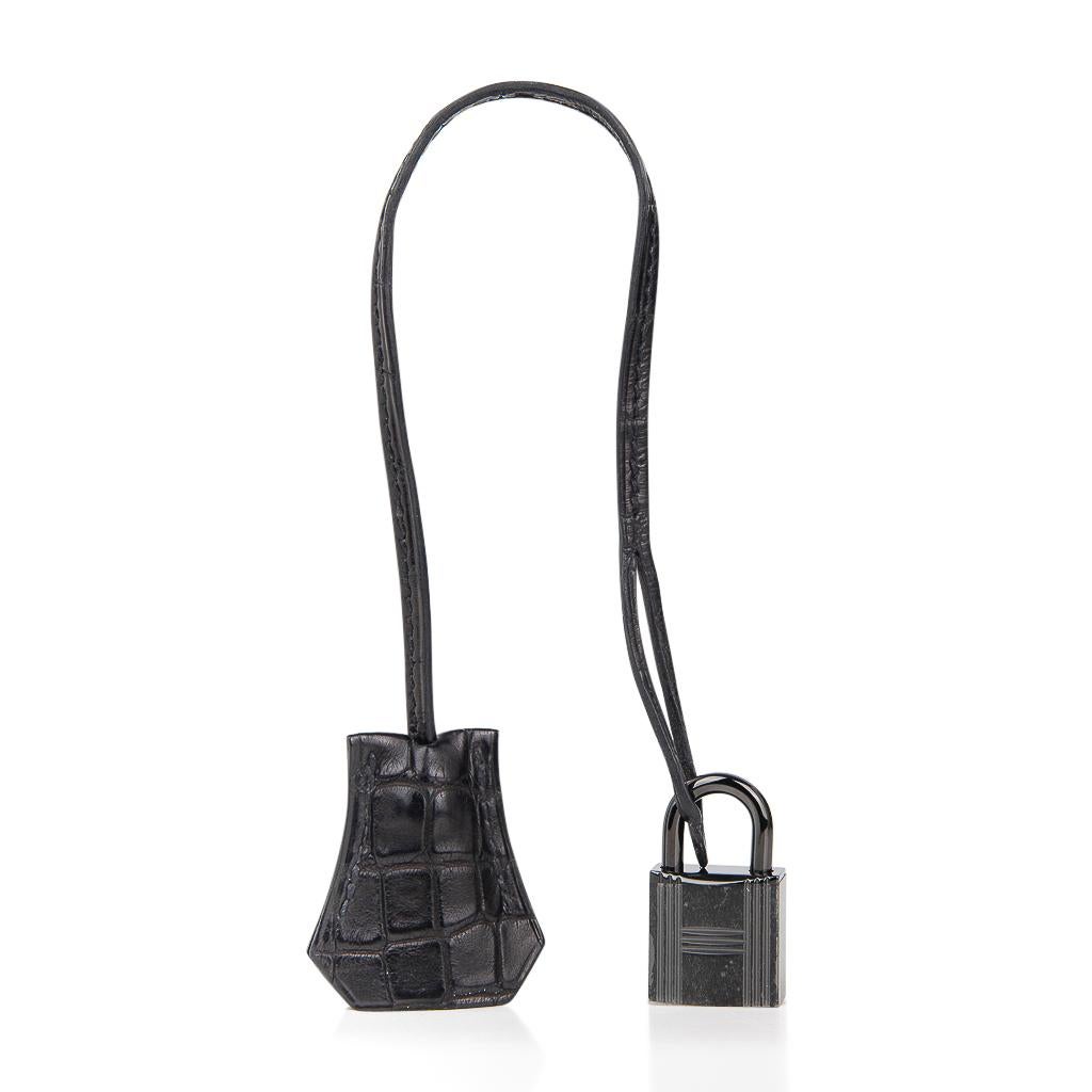 Hermes Birkin 35 So Black limited edition matte Alligator bag.
Near impossible to find this beauty is one of the most coveted among Hermes collectors.
This exquisite bag is very like new condition.  
No wear to corners or handles.
Comes with lock,