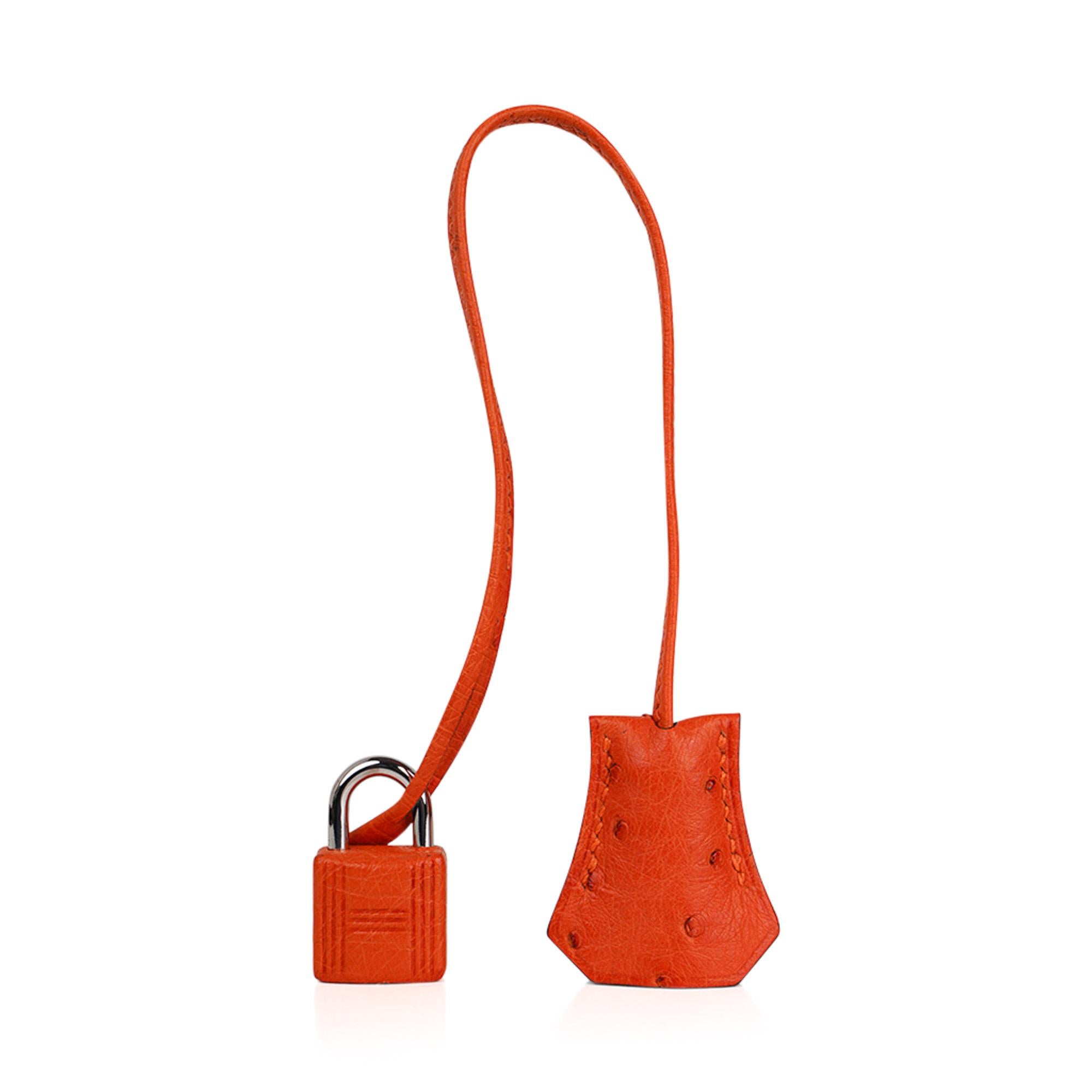 Mightychic offers a guaranteed authentic Hermes Birkin 35 bag featured in Tangerine Ostrich.
This beautiful and wearable color is a rare find.
This Hermes Birkin is lush with Palladium hardware.
Comes with lock, keys, clochette, and sleeper.
Like
