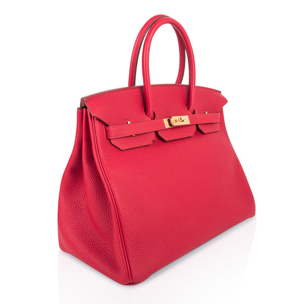 Mightychic offers an Hermes Birkin 35 bag featured in Vermillion.
Unique warm red tone - is lush with gold hardware.
Togo leather is scratch resistant.
NEW or NEVER WORN. 
Comes with lock, keys, clochette, sleepers, raincoat and signature Hermes box