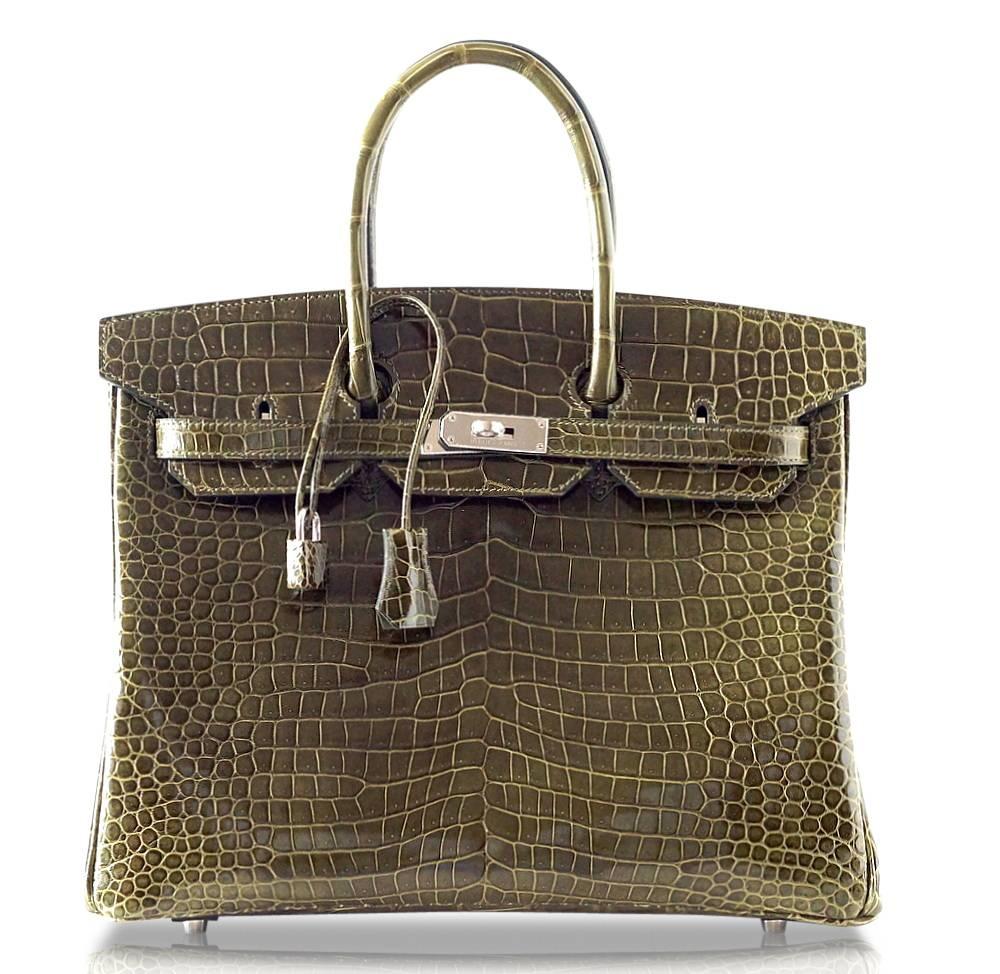 Rare Hermes Vert Veronese army toned green makes the perfect year round colour and is utterly neutral. 
In exquisite Porosus Crocodile which is the small scale and the most exclusive.
Fresh with palladium hardware.
NEW or NEVER WORN. 
Comes with
