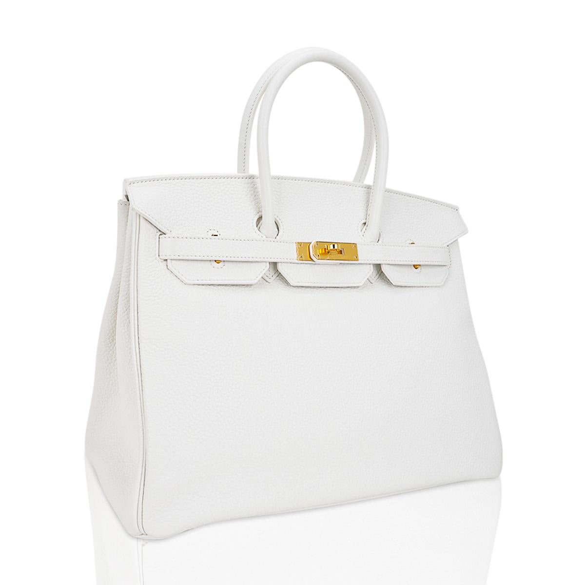 Mightychic offers an Hermes Birkin 35 bag featured in White.
Lush with Gold hardware.
A beautiful year round neutral colour, White is the most rare of all Hermes colours produced in leather.
This Hermes Birkin is created with plush Clemence