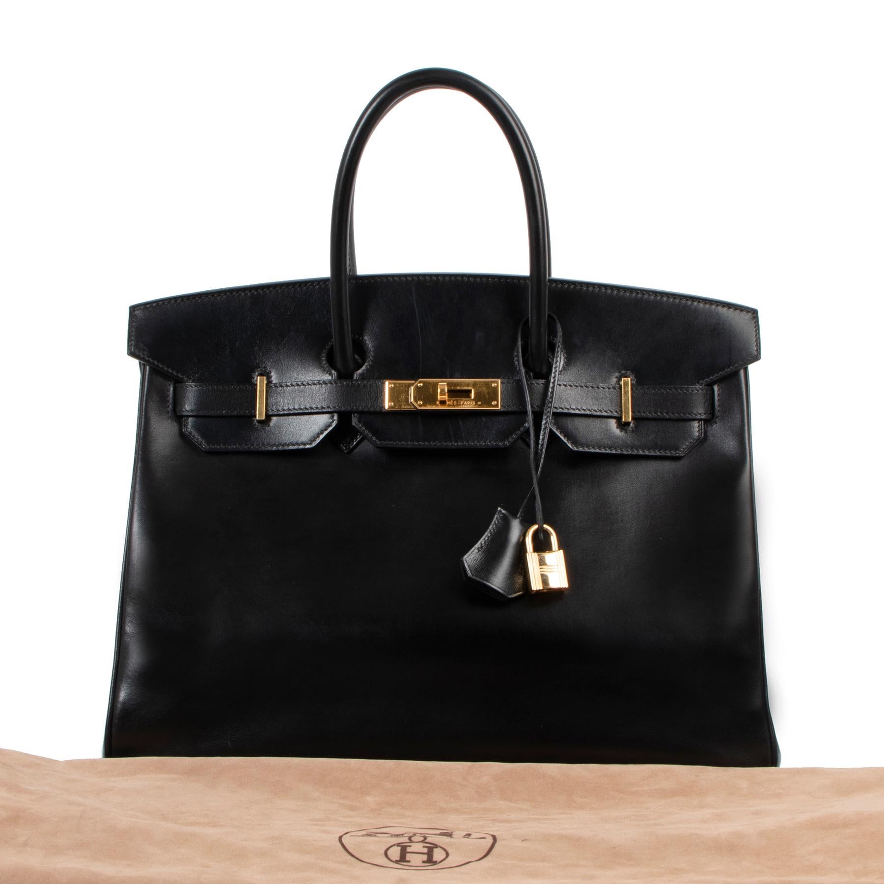 Hermès Birkin 35 Black Box Gold Hardware

This is simply a dream came true. The ultra-coveted Box leather with its lustrous shine and irresistible texture, paired with gleaming golden hardware on this Hermès Birkin 35.

The structured Box leather in