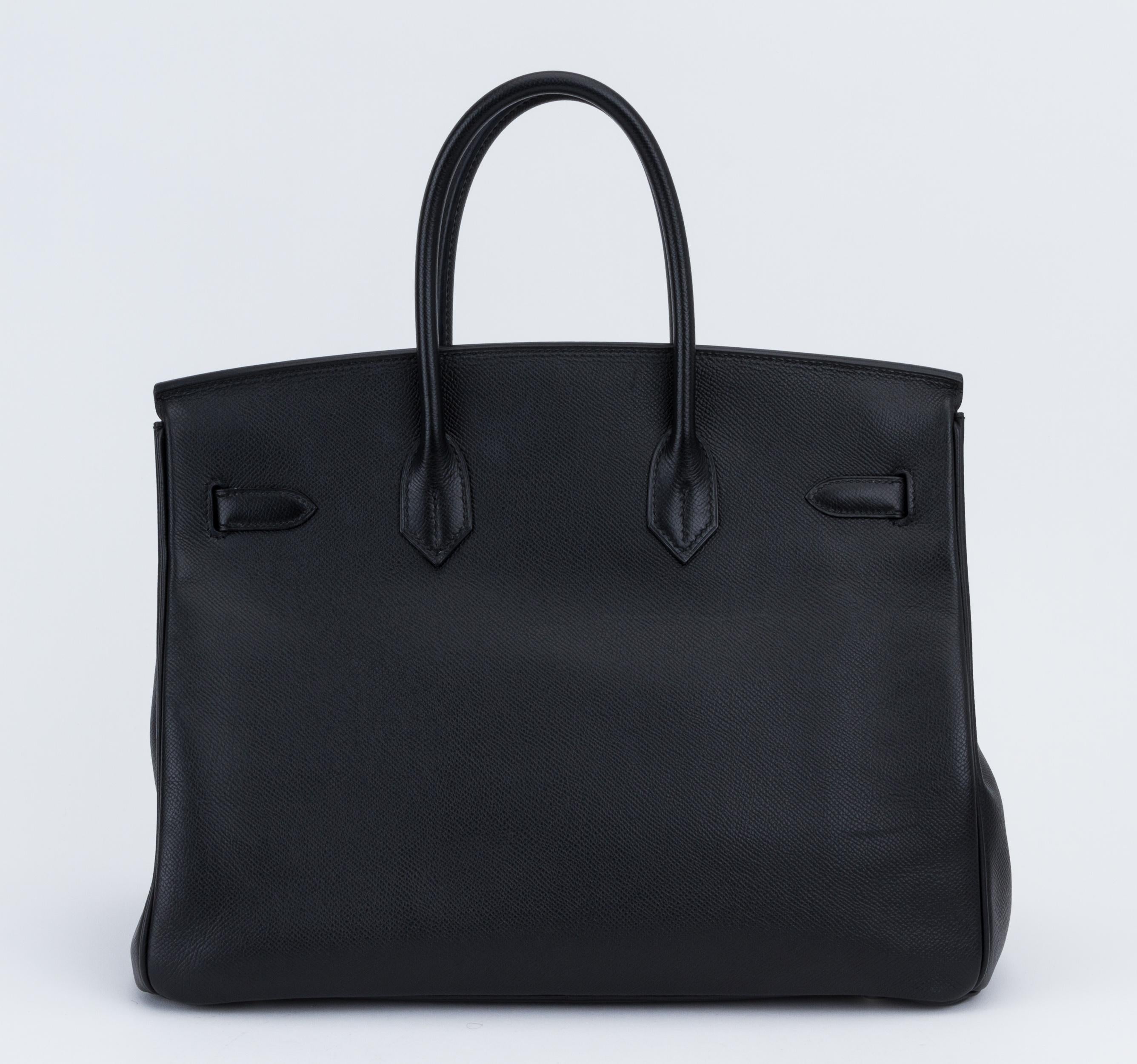 Hermès Birkin 35 cm in black epsom leather and palladium hardware. Excellent condition except for two minor scuffs in the back (please refer to photos). Handle drop, 4