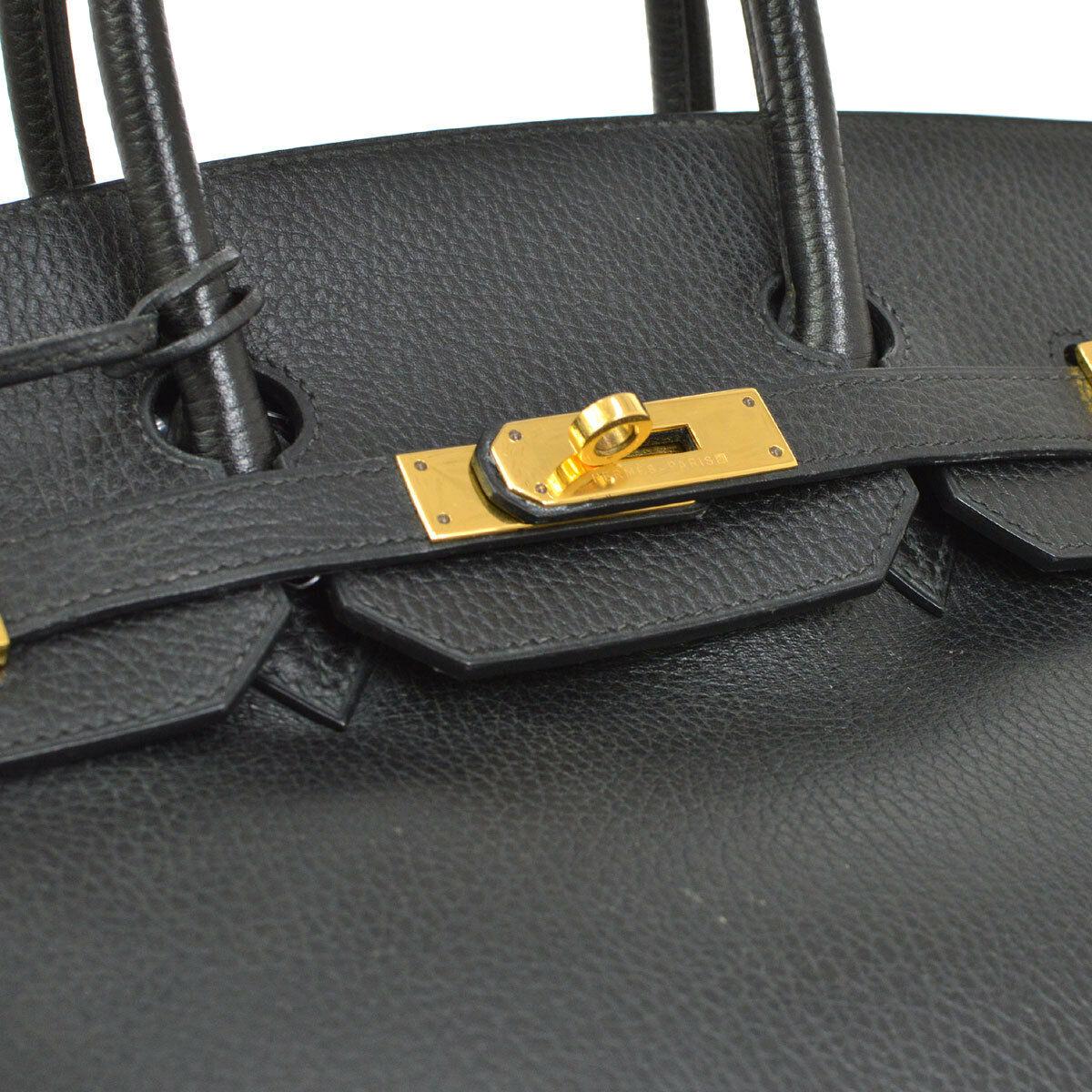 Hermes Birkin 35 Black Leather Gold Top Handle Satchel Travel Tote Bag

Leather
Gold tone hardware
Leather lining
Date code present
Made in France
Handle drop 4