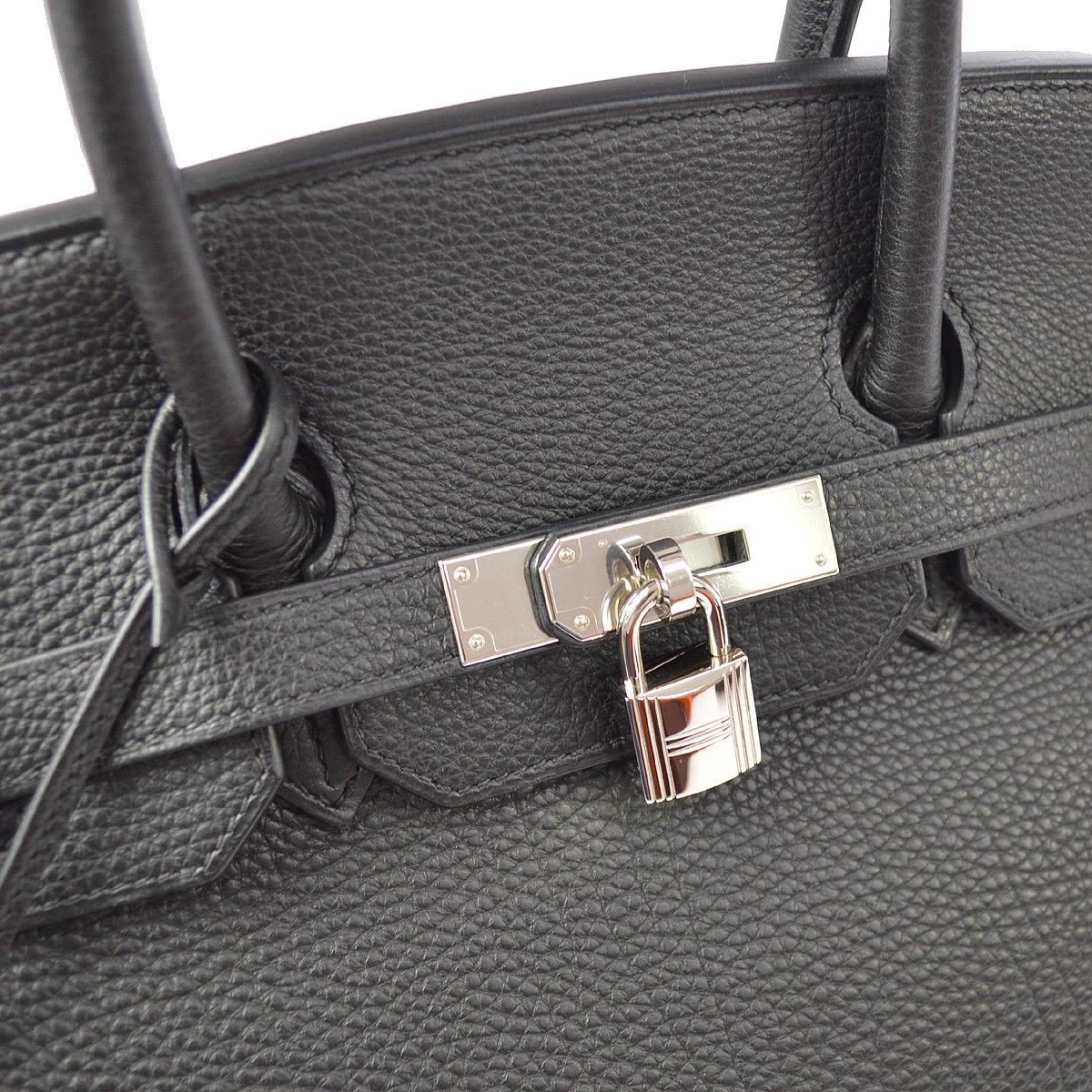 Hermes Birkin 35 Black Leather Palladium Top Handle Satchel Travel Tote Bag in Box

Leather
Palladium tone hardware
Leather lining
Date code present
Made in France
Handle drop 4