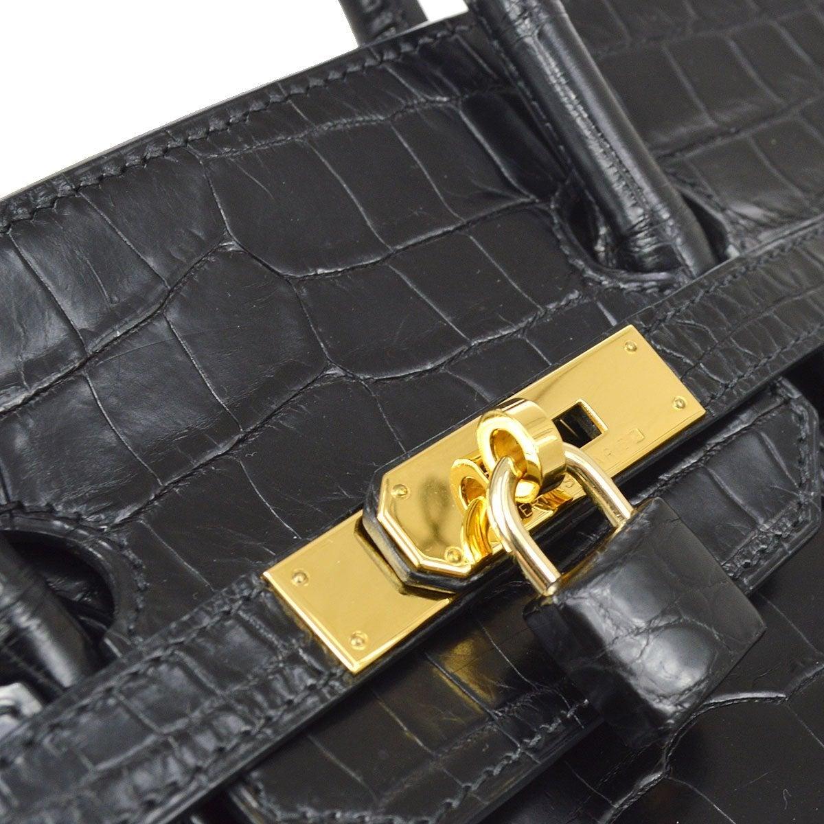 Pre-Owned Vintage Condition
From 2001 Collection
Crocodile Porosus
Gold Tone Hardware
Leather Lining
Measures 13.5