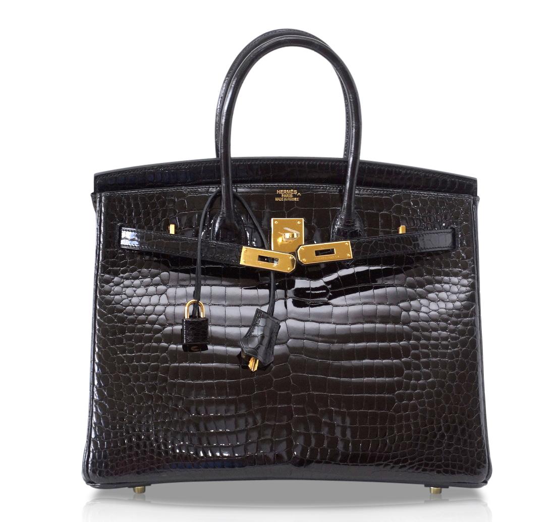 Mightychic offers an Hermes Birkin 35 bag featured in coveted Porosus Crocodile in Black. 
Porosus Crocodile is the most exclusive created from the the smallest  scales. 
The scales on this bag are extraordinary!
Rich with gold hardware.
NEW or