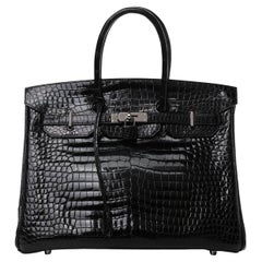 HERMES Birkin 35, schwarze, glänzende, exotische Tragetasche aus Krokodilleder