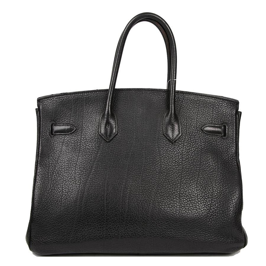 HERMES Birkin 35 black Togo leather bag. The jewelry is in silver metal.
The bag is in very good condition. Made in France.
Dimensions: 35 x 28 x 18 cm.
Stamp M in a Square (2009 year). 
Its zipper, bell, keys (2) and padlock are present.

Will be