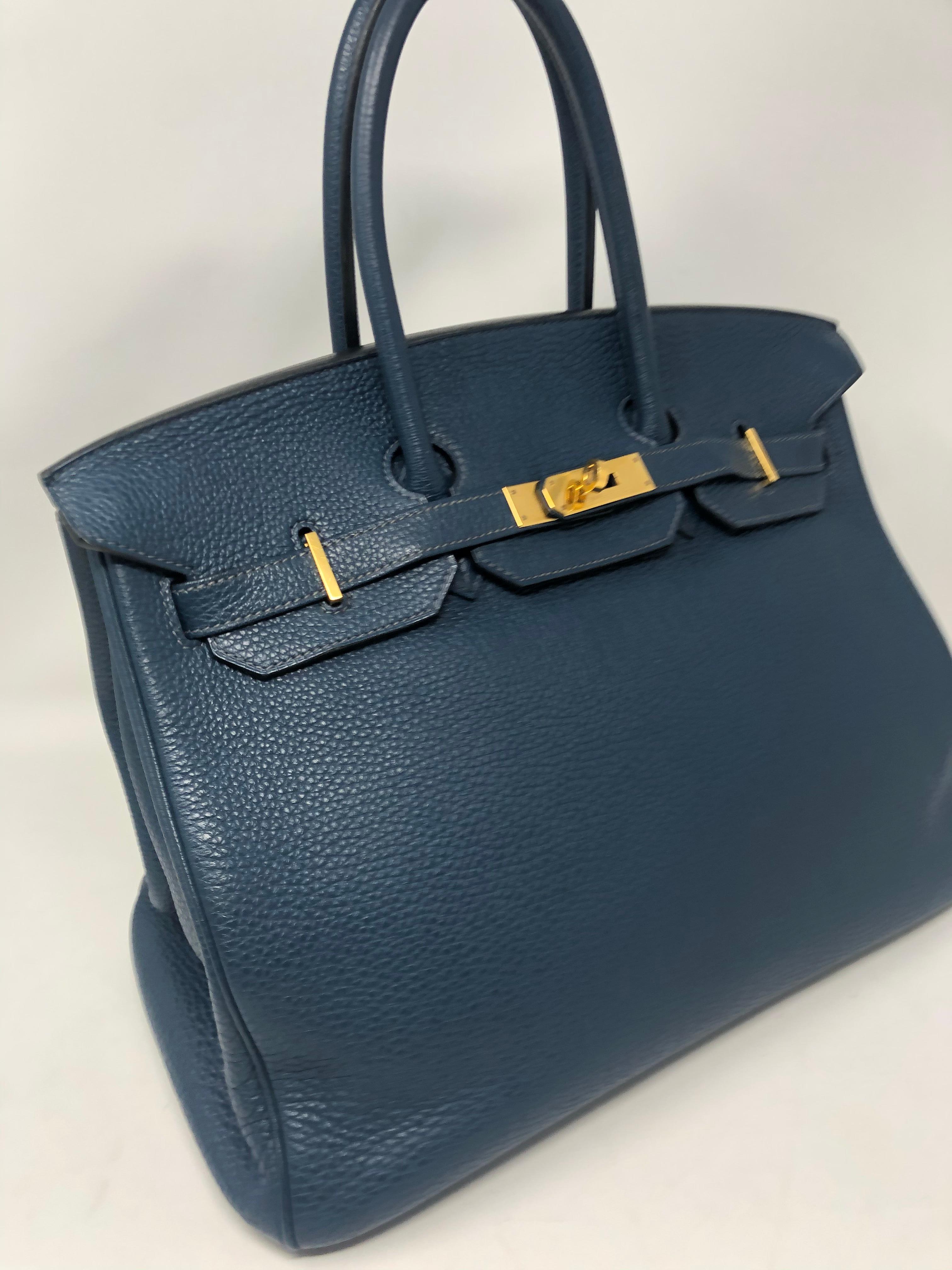 Hermes Birkin Blue De Malte Togo Leather Bag. Gold hardware. Size 35. Classic size. Beautiful sapphire blue color. Rare color and good condition. Stamp N square. From 2010. No corner wear. Neutral blue color will go with almost anything. Guaranteed
