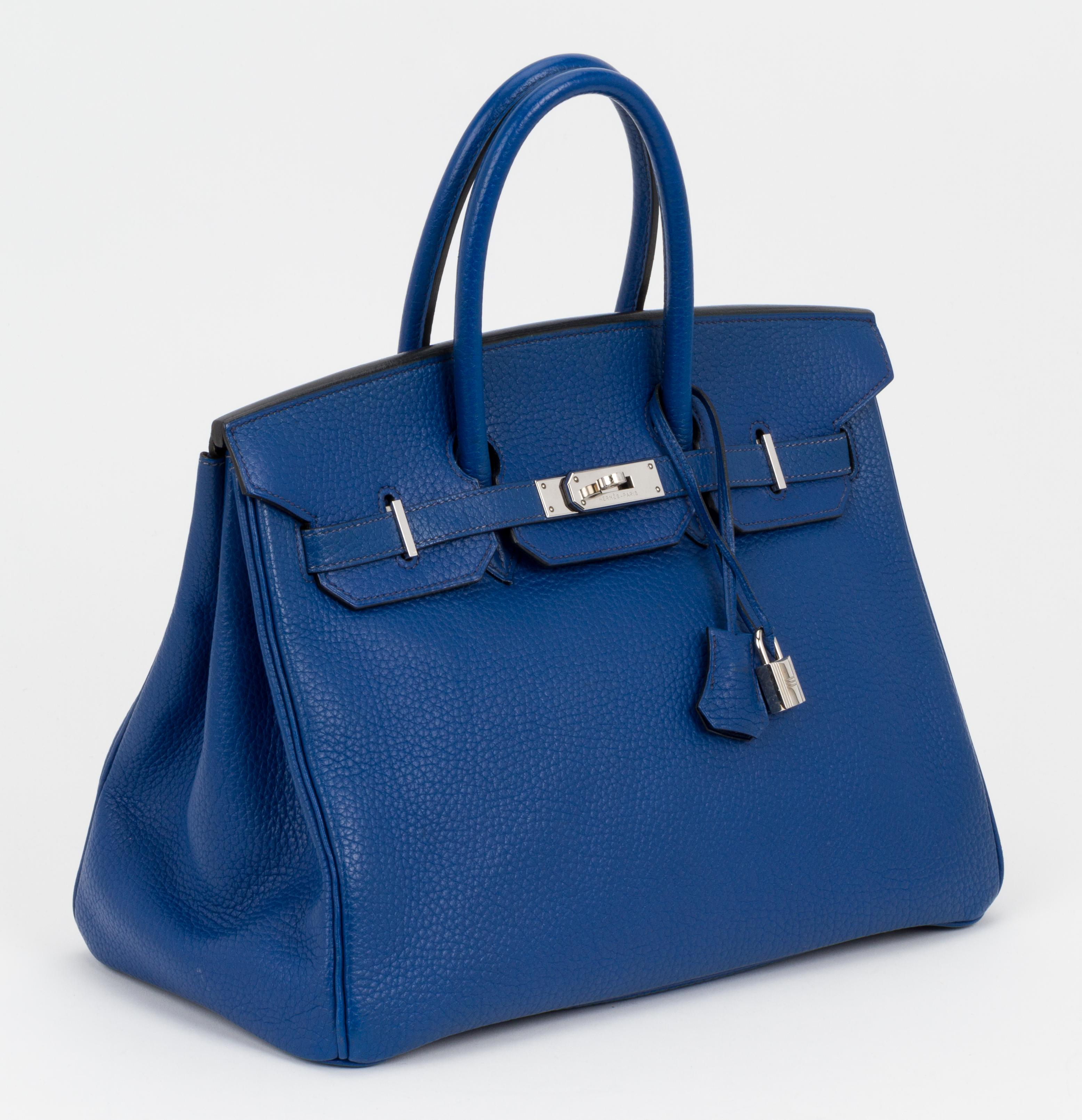 Hermès Birkin 35 cm preowned in blue de France togo leather and silver tone hardware. Very good condition, except for a few scratches on metal plates and loose turn lock. Handle drop, 4