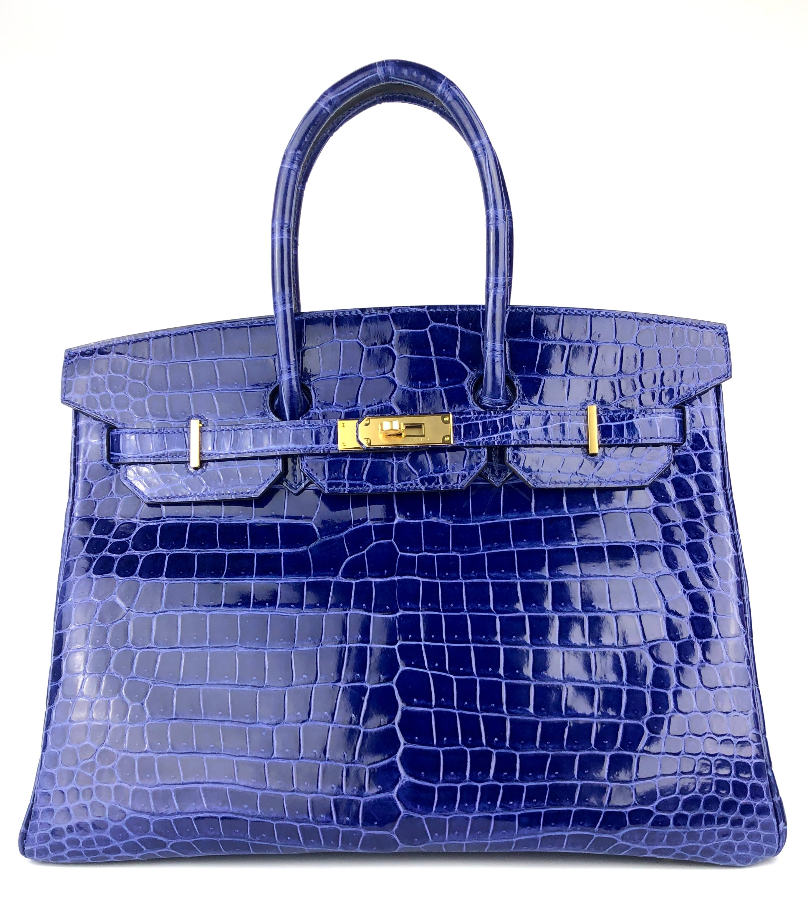 Absolutely Stunning RARE Hermes Birkin 35 Blue Electric Crocodile Skin Leather Gold Hardware. Pristine Condition, Plastic on hardware, perfect structure and corners. 

BEST PRICE ON THE MARKET! 

Please keep in mind that this is a pre owned item,