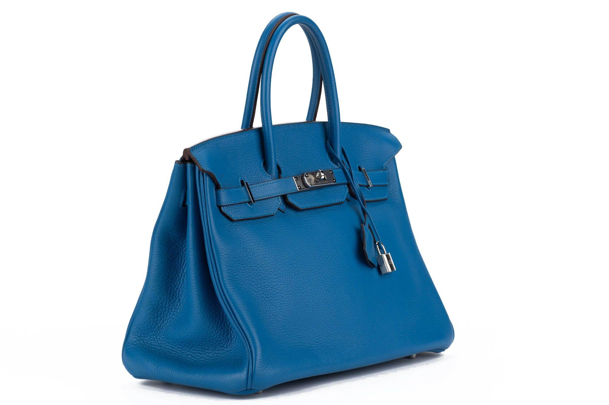 Hermès Birkin 35 in  taurillon clemence blue izmir  with palladium hardware. Pre-owned in excellent condition. 
Comes with original large and small dust cover.