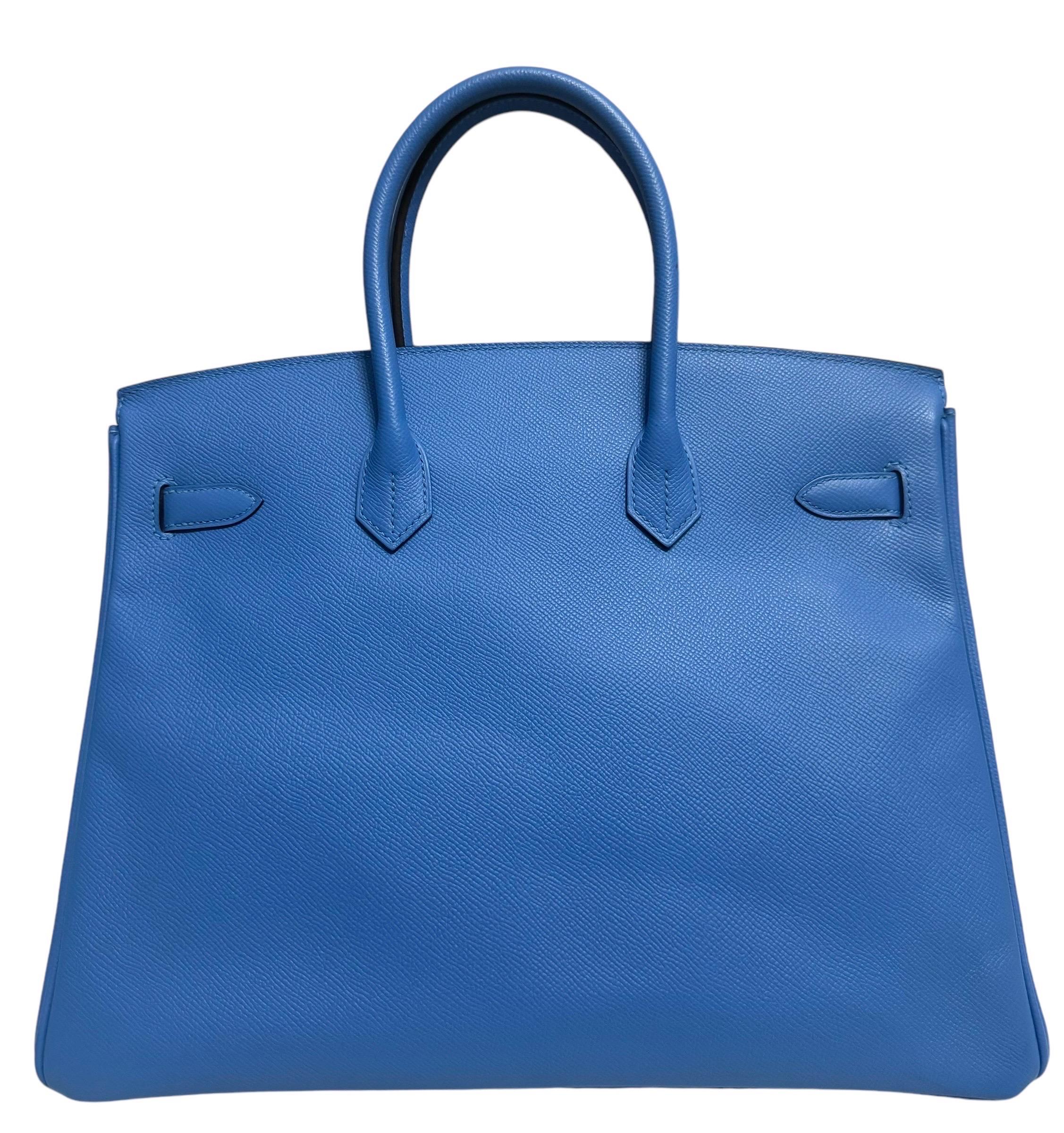 Absolutely Stunning Most Coveted  Hermes Birkin 35 Blue Paradise Epsom Leather complimented by Gold Hardware.  

Pristine Condition, Plastic on all Hardware.

Please keep in mind that this is a pre owned item, the bag has been carried before, unless