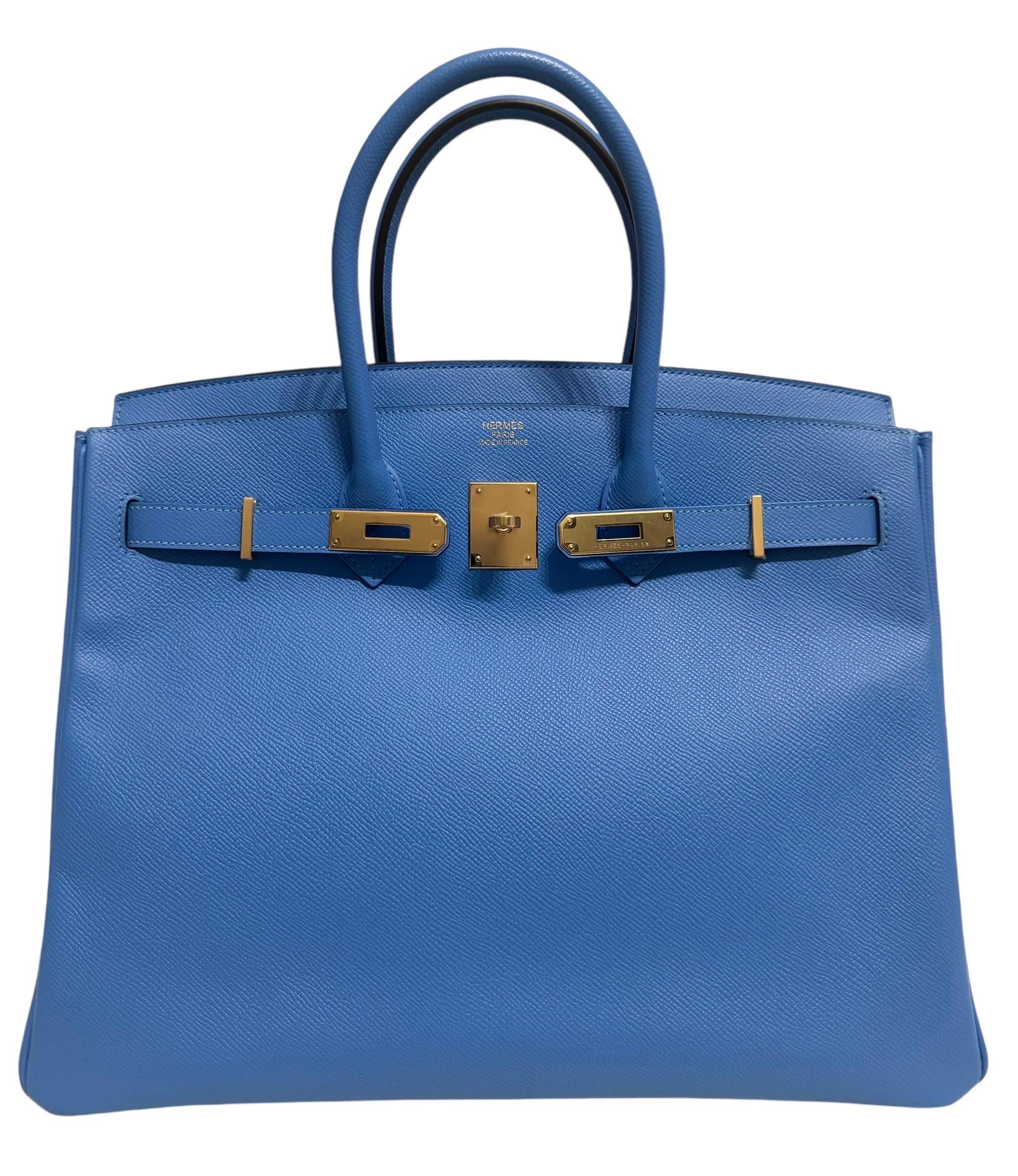 Women's or Men's Hermes Birkin 35 Blue Paradise Epsom Leather complimented by Gold Hardware.