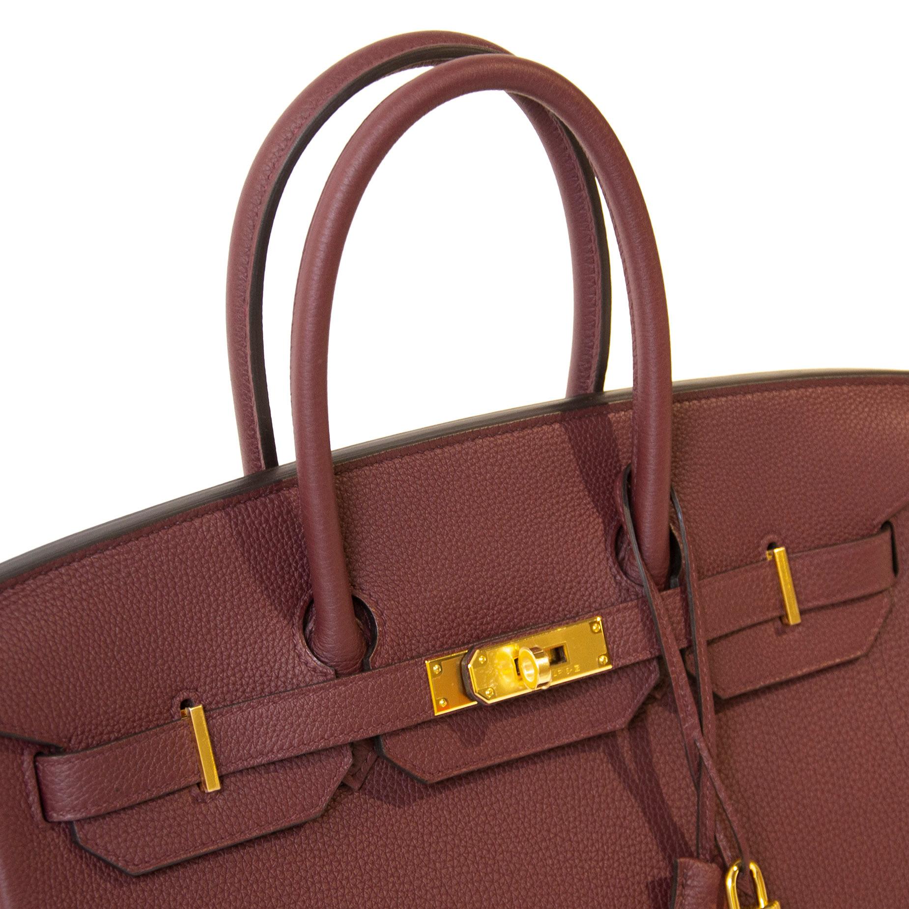 This beautiful and brand new Hermès Birkin bag in the size 45 is crafted out of luxurious Togo leather and comes in a warm burgundy leather called 'Bordeaux'. This Birkin bag has gold toned hardware.

Comes with: FULL SET

    dust bag
    box
   