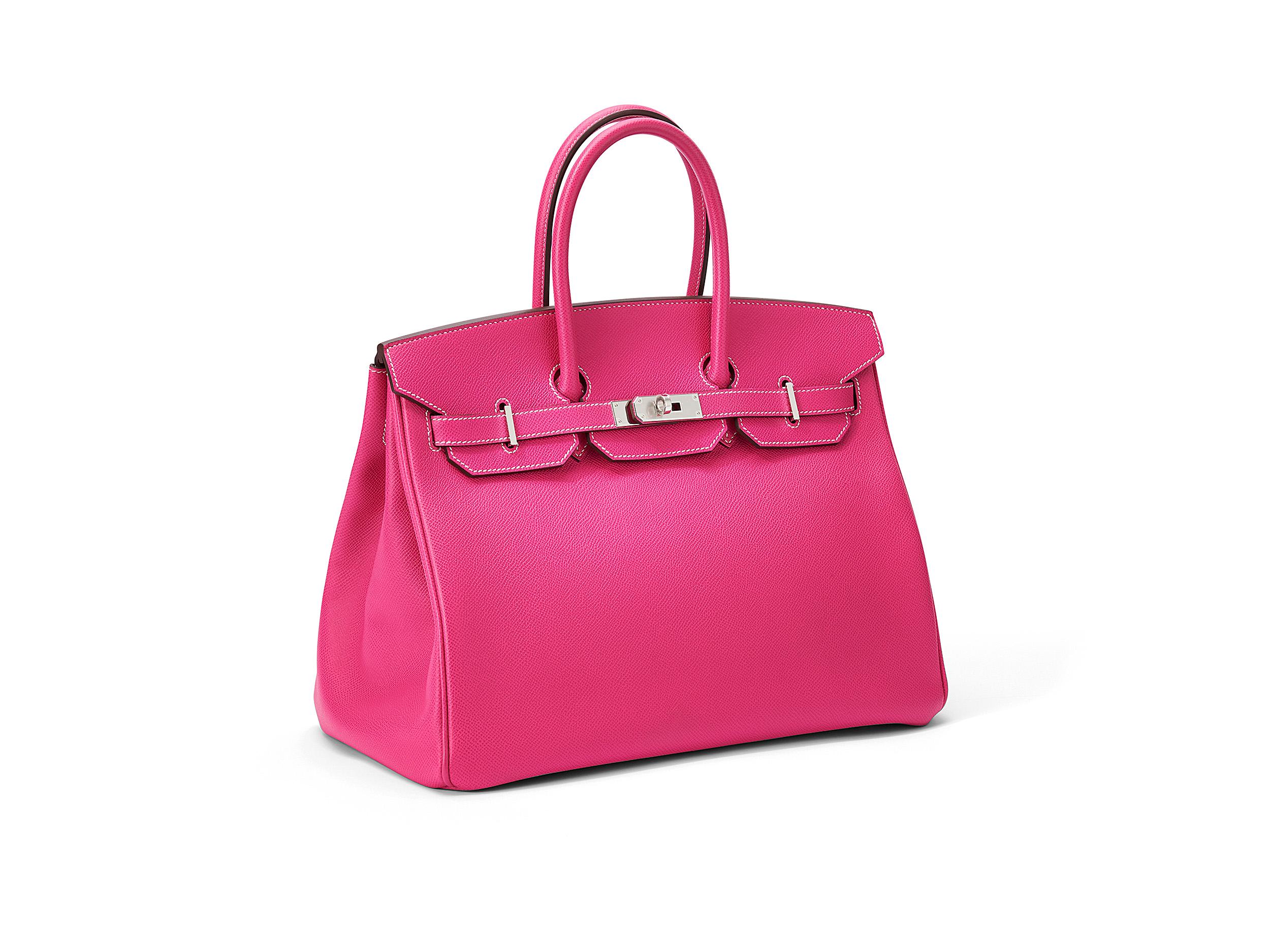Hermès Birkin Candy 35 in rose tyrien and epsom leather with palladium hardware. The bag is unworn but has scratches on two of four feet and a minor mark on the bottom. Comes as full set including the original receipt. Stamp P (2012) 


