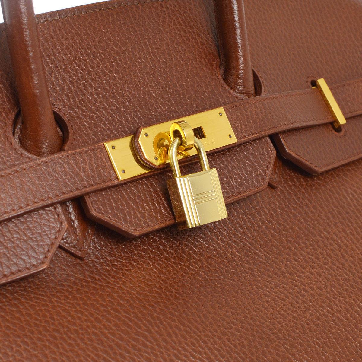 Hermes Birkin 35 Chocolate Brown Leather Silver Gold Carryall Travel Top Handle Satchel Tote

Leather
Gold tone hardware
Leather lining
Date code present
Made in France
Handle drop 4.25