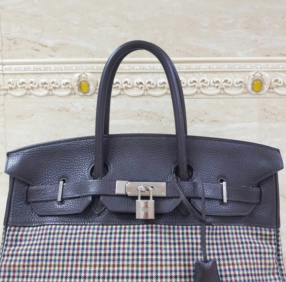  Authentic Hermès Birkin 35 Taurillon Clemence Leather and Houndstooth Canvas

Details: Chocolate Brown Taurillon Clemence Leather / Beige with Red and Green Stripe Fabric / Palladium Hardware / Dual Rolled Handles / Protective Studs at Base / Brown